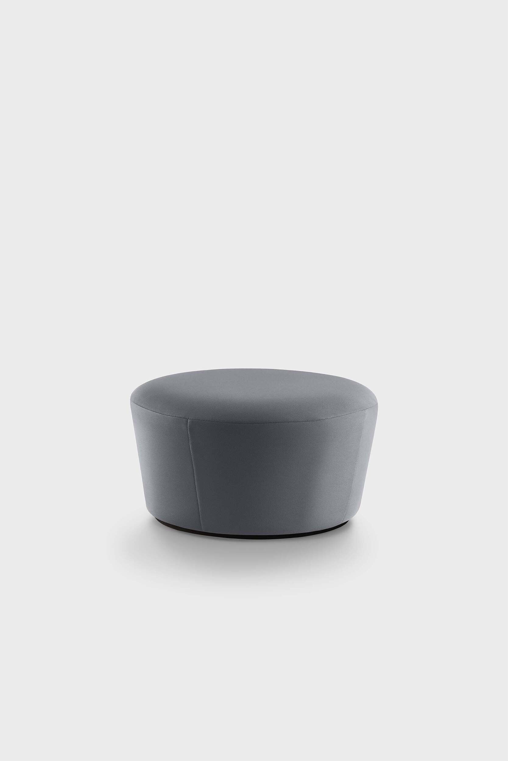 Naïve Pouf featuring a cupcake silhouette in soft velour, perfect for stylish seating in any room.