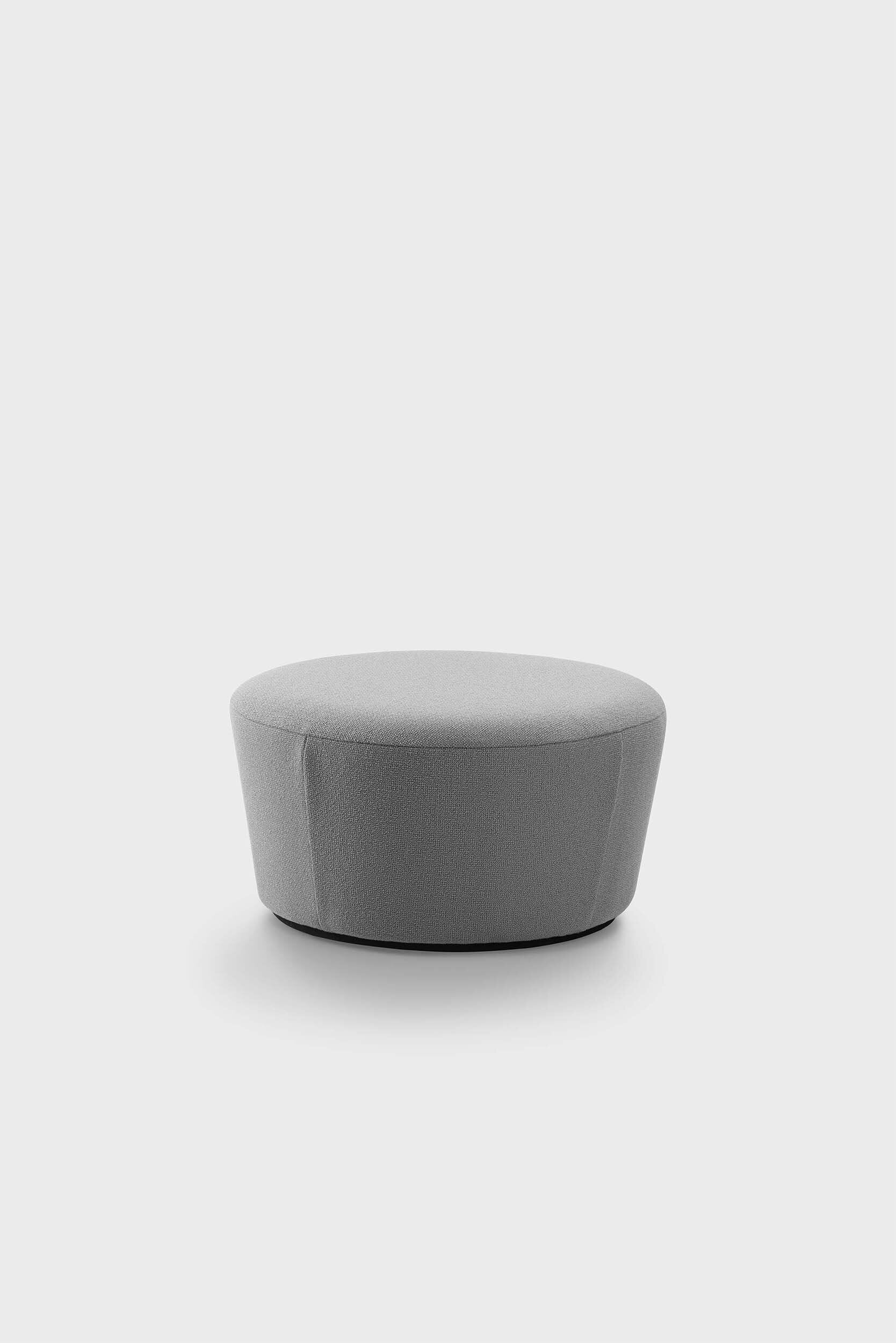 Naïve Pouf featuring a cupcake silhouette in soft velour, perfect for stylish seating in any room.