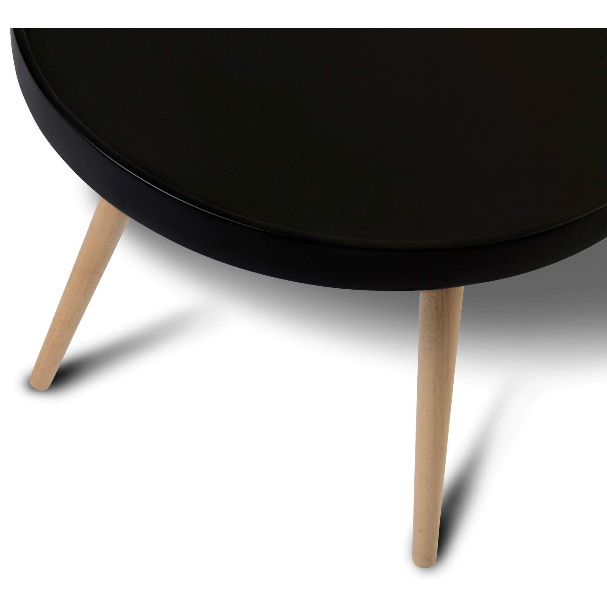 Opus round black coffee table with a diameter of 90 cm, showcasing Scandinavian design and elegant craftsmanship.