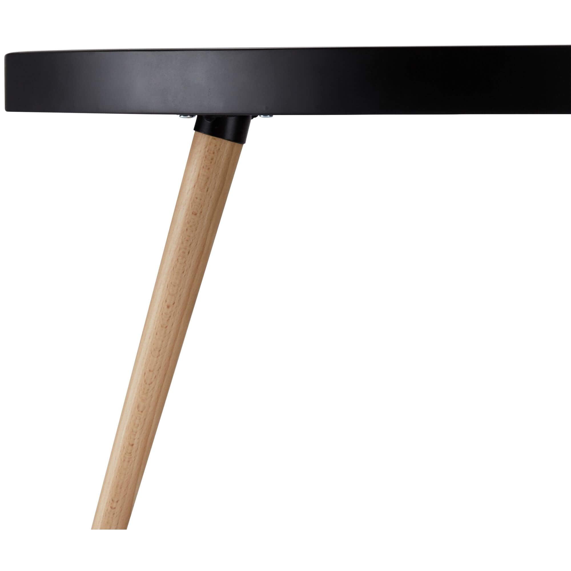 Opus round black coffee table with a diameter of 90 cm, showcasing Scandinavian design and elegant craftsmanship.