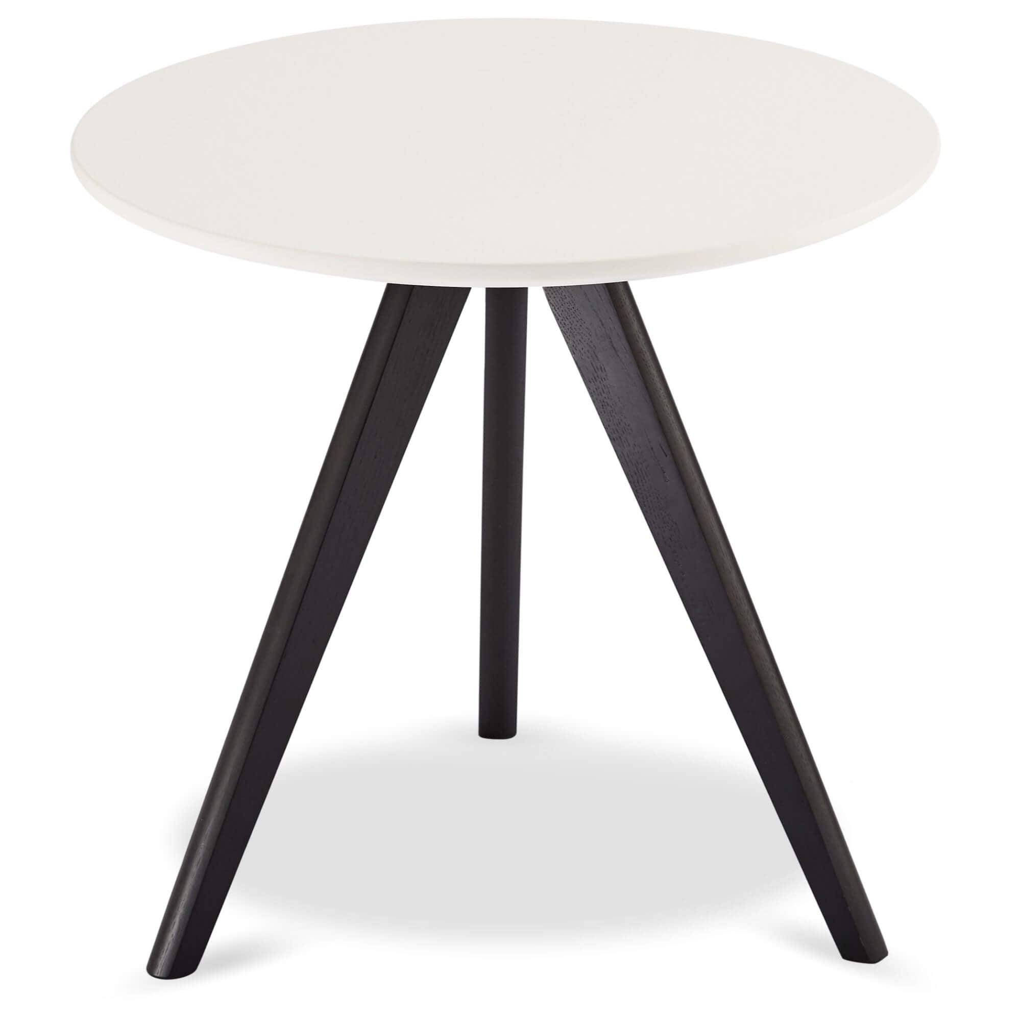 Round coffee table with white and black tabletop, featuring sturdy lacquered oak legs, designed for modern interiors.
