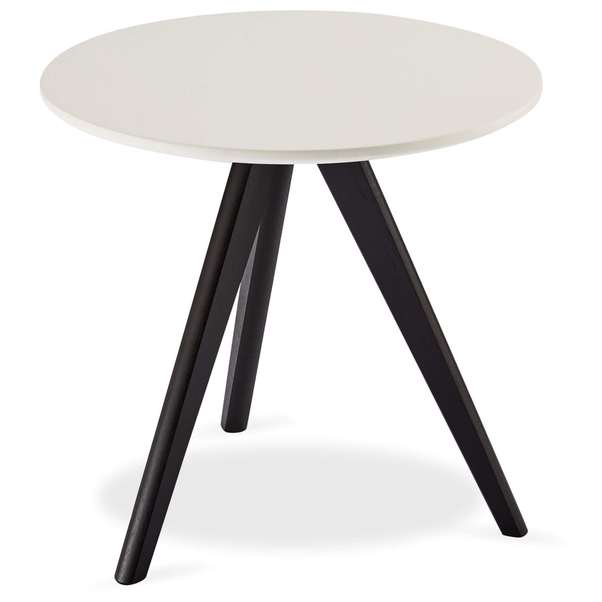 Round coffee table with white and black tabletop, featuring sturdy lacquered oak legs, designed for modern interiors.