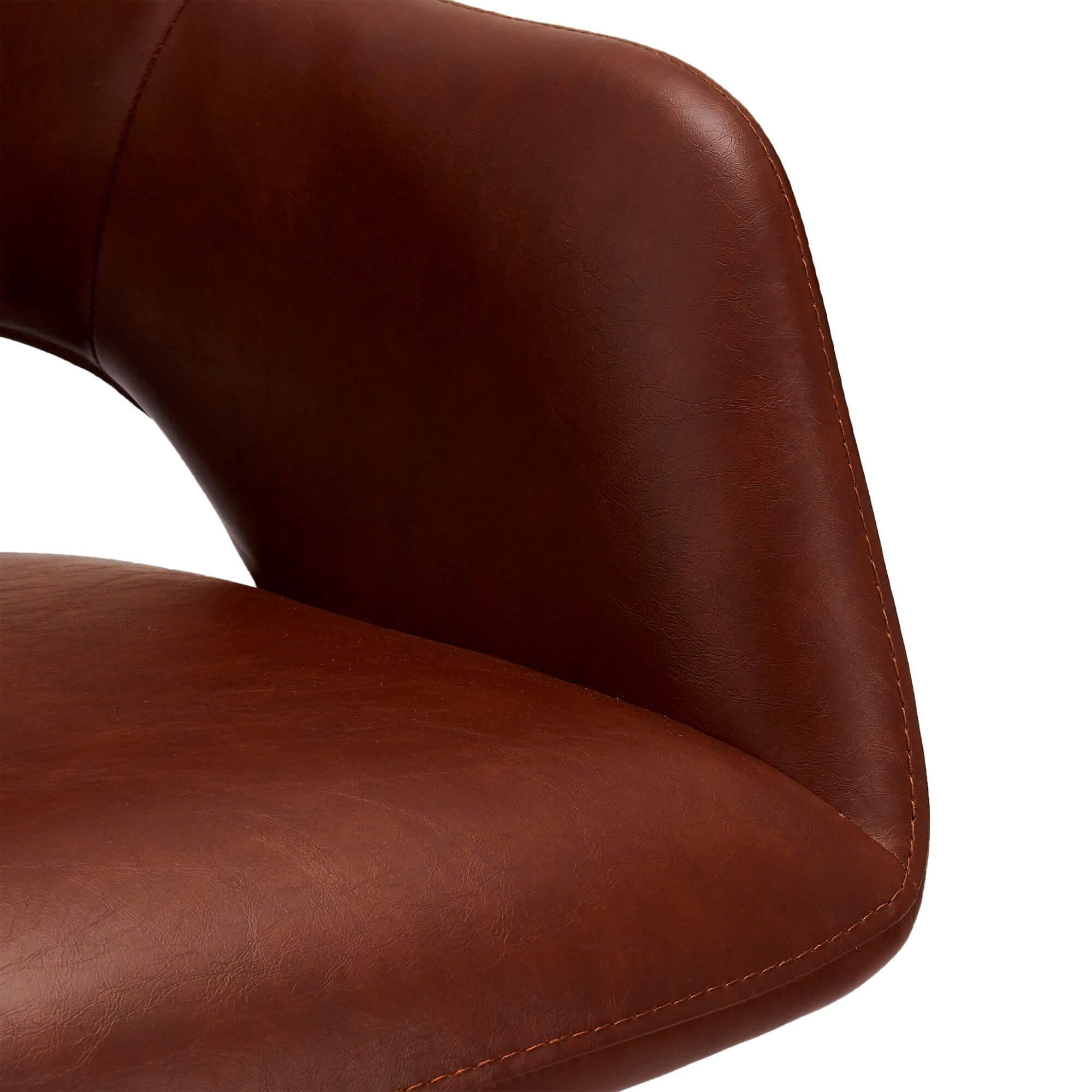 Set of 2 light brown dining chairs with elegant stitching and swivel function, perfect for vintage or industrial decor.