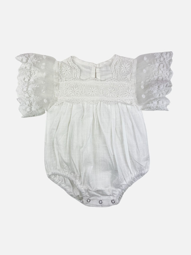 Amelie Lace Onesie in white and beige featuring lace ruffled sleeves and a bubble fit design, perfect for summer wear.