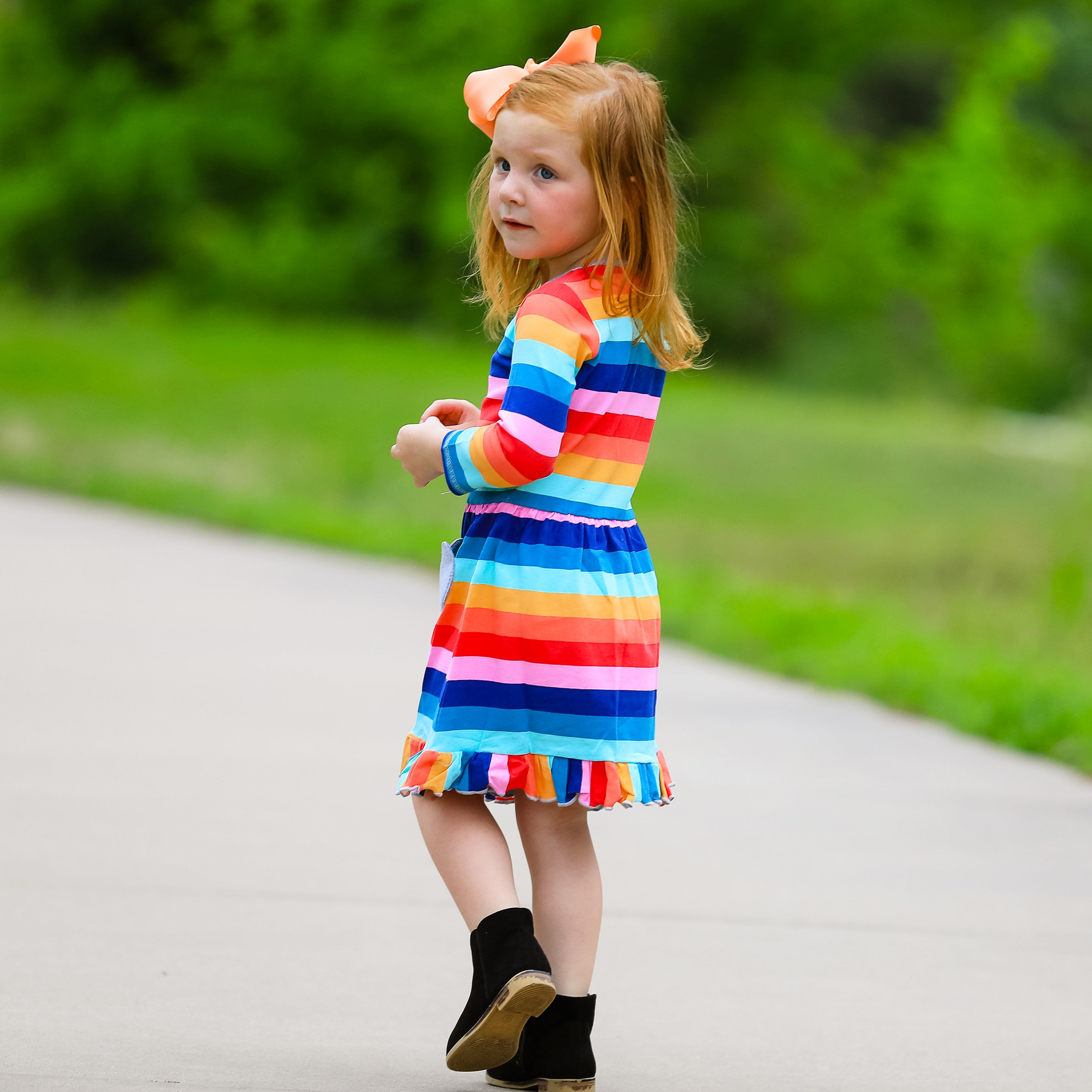 AnnLoren Baby Big Girls Boutique Fall Rainbow Hearts Cotton Winter dress featuring a vibrant rainbow print and silver heart appliques, perfect for autumn and winter.