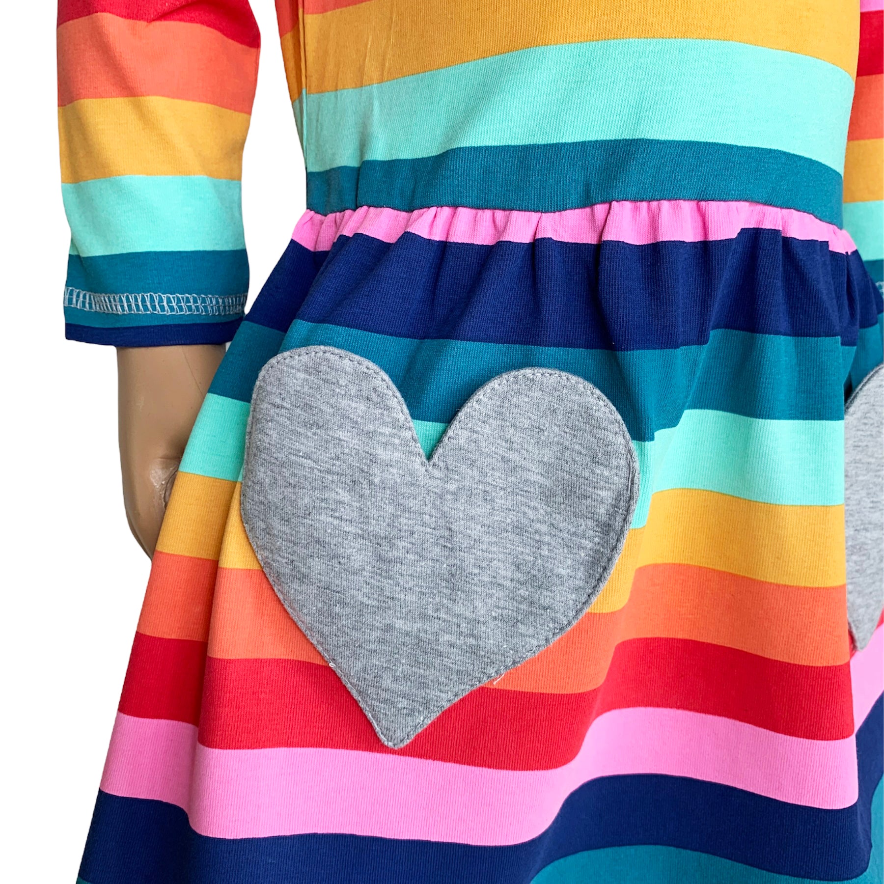 AnnLoren Baby Big Girls Boutique Fall Rainbow Hearts Cotton Winter dress featuring a vibrant rainbow print and silver heart appliques, perfect for autumn and winter.