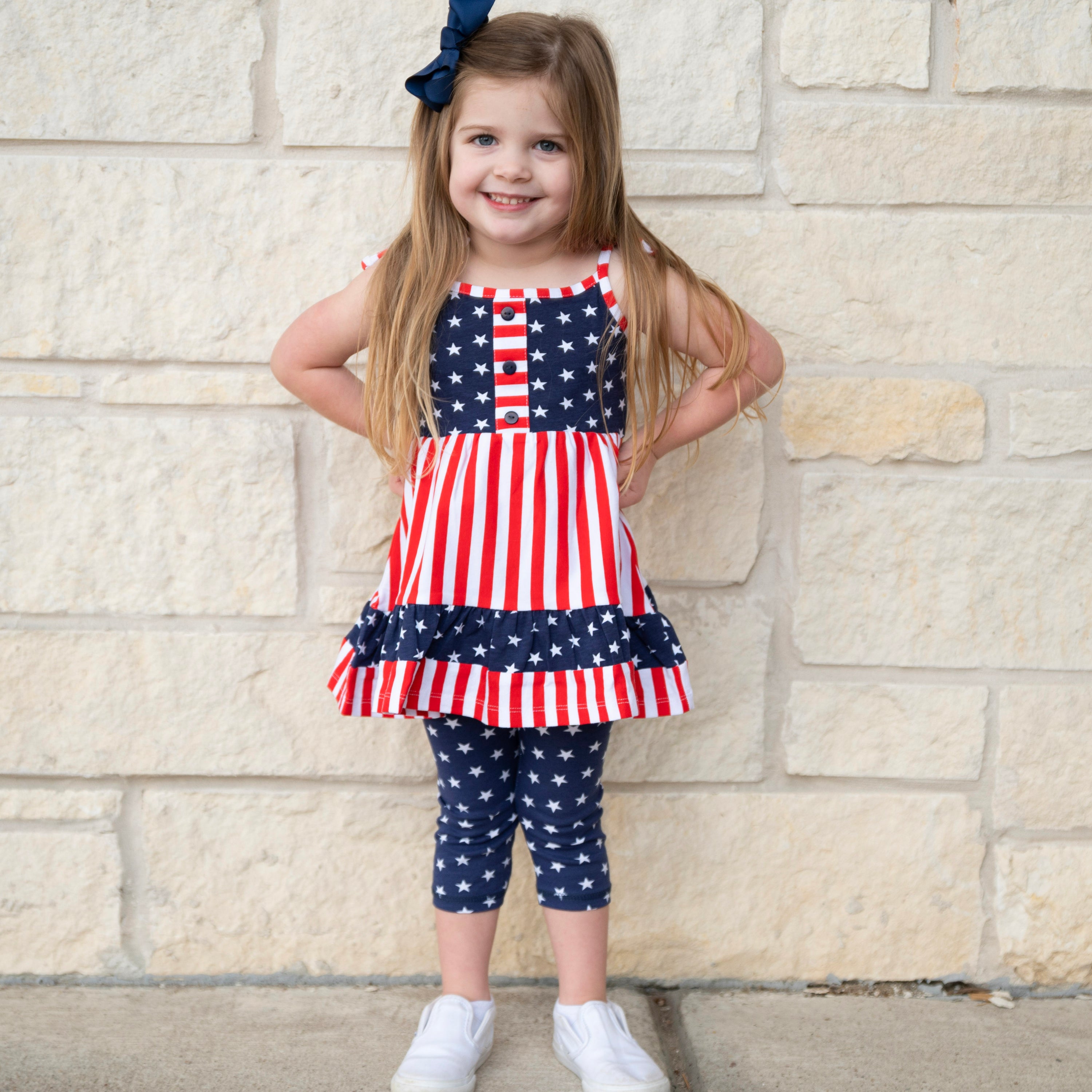 AnnLoren Girls 4th of July dress featuring red and white stripes with blue stars, paired with blue star capri leggings.