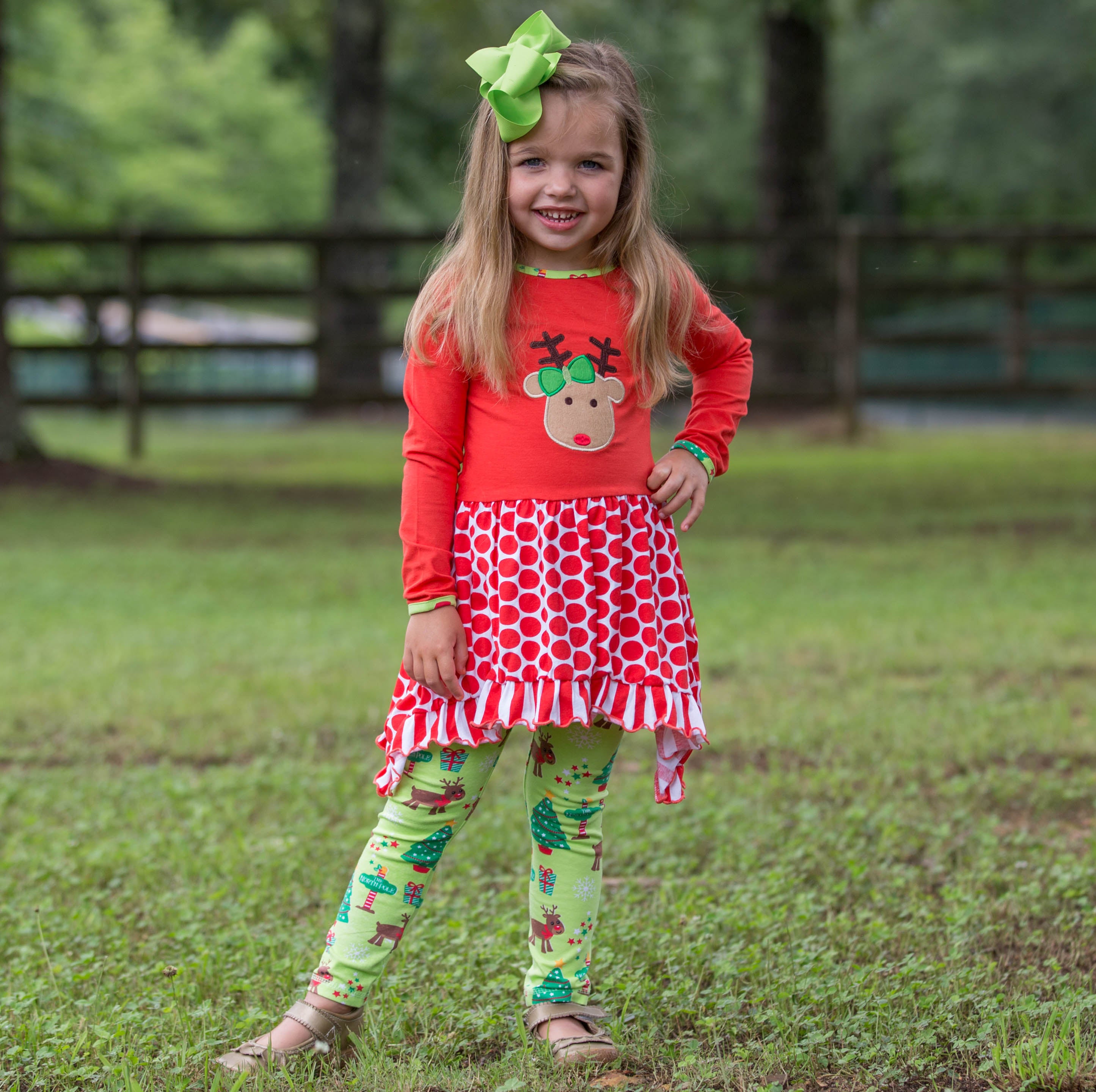 AnnLoren Girls Christmas Reindeer Tunic and Holiday Legging Set featuring a reindeer applique, polka dot tunic, and green knit leggings.