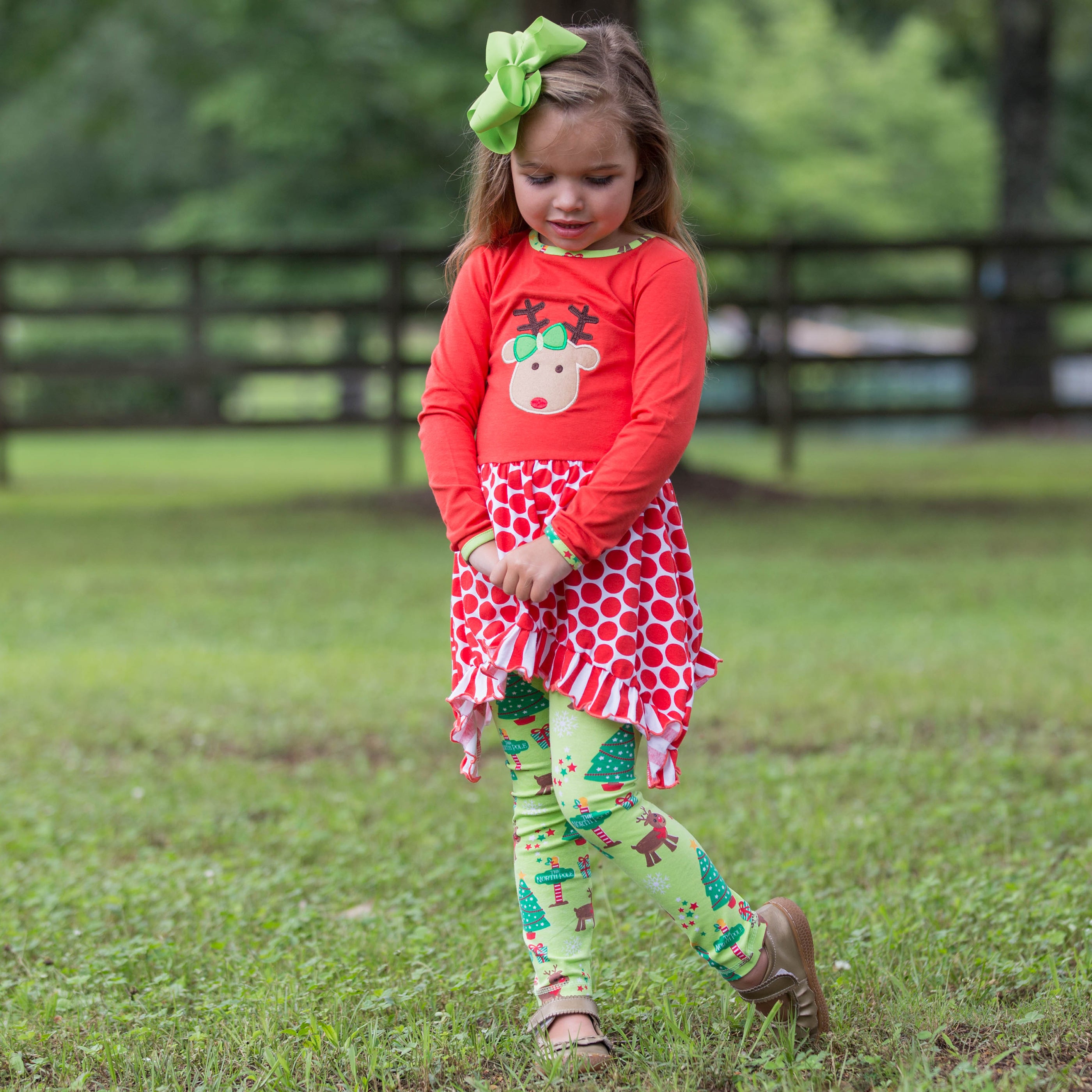 AnnLoren Girls Christmas Reindeer Tunic and Holiday Legging Set featuring a reindeer applique, polka dot tunic, and green knit leggings.