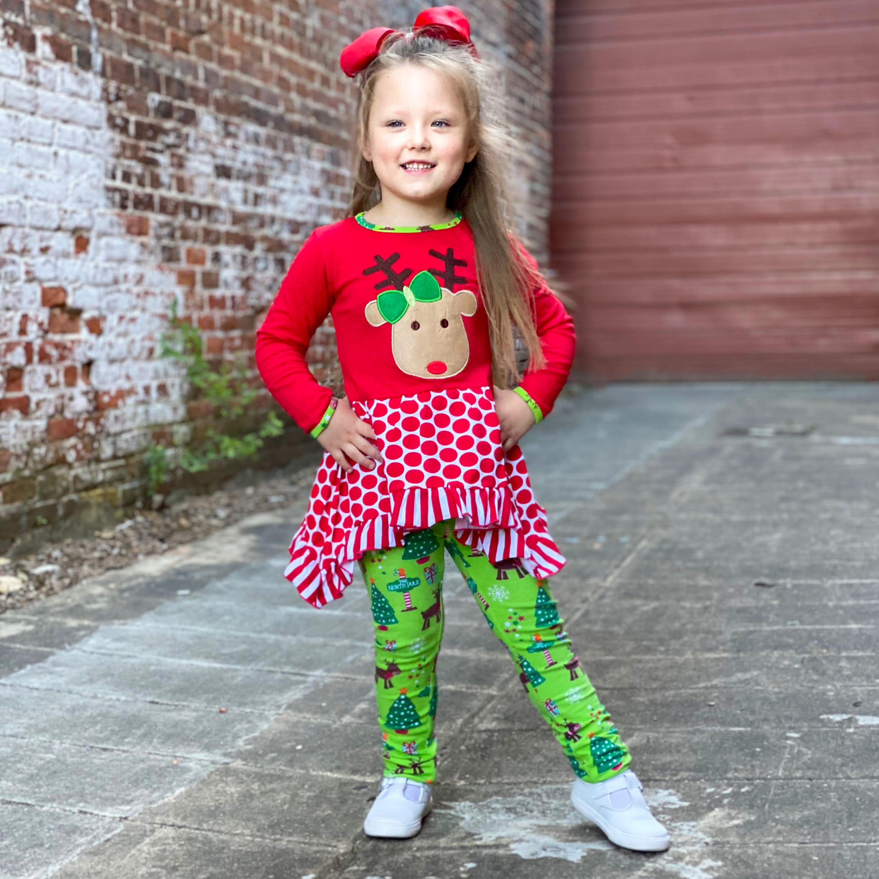 AnnLoren Girls Christmas Reindeer Tunic and Holiday Legging Set featuring a reindeer applique, polka dot tunic, and green knit leggings.