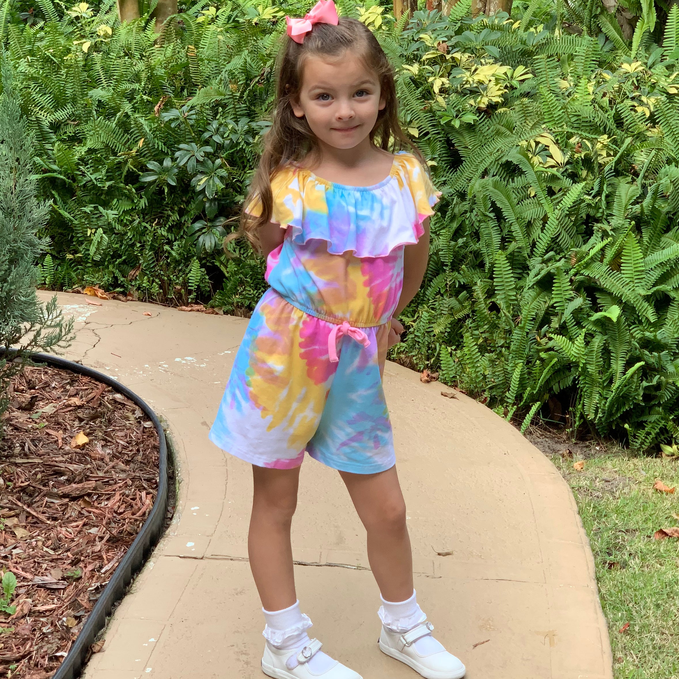 AnnLoren Girls Pastel Tie Dye Shorts Jumpsuit featuring vibrant pastel colors and a stylish bow detail at the waist.