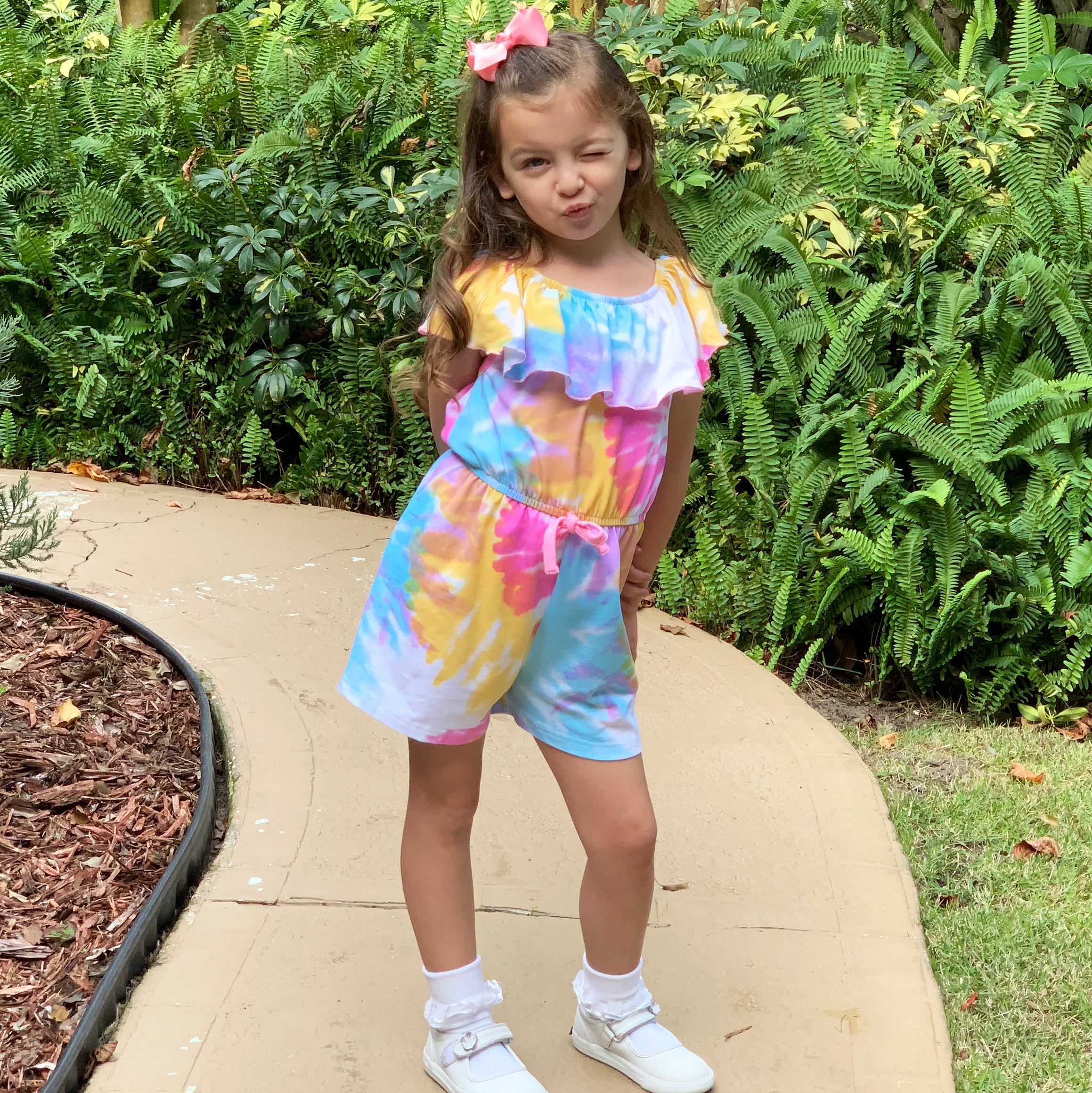 AnnLoren Girls Pastel Tie Dye Shorts Jumpsuit featuring vibrant pastel colors and a stylish bow detail at the waist.