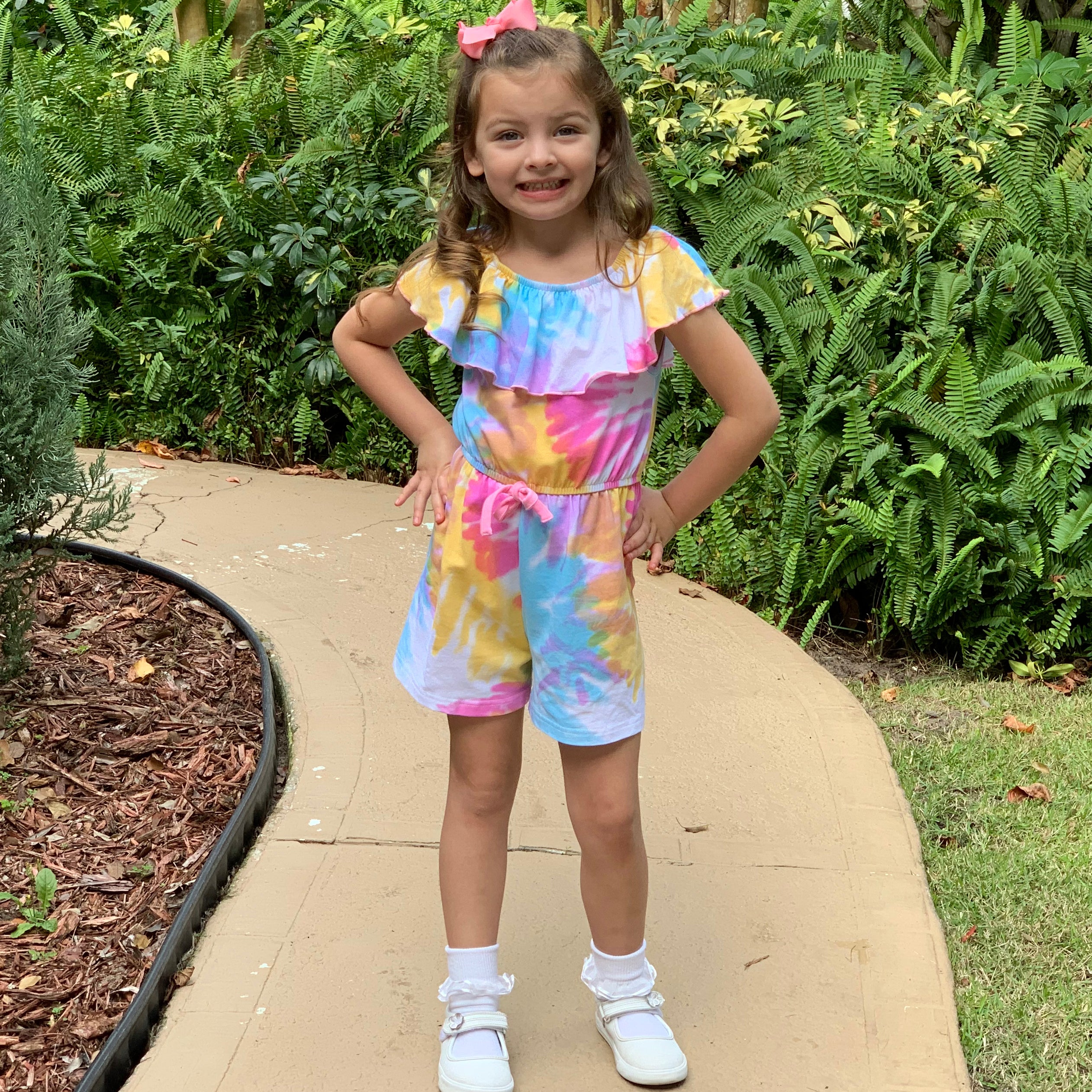 AnnLoren Girls Pastel Tie Dye Shorts Jumpsuit featuring vibrant pastel colors and a stylish bow detail at the waist.