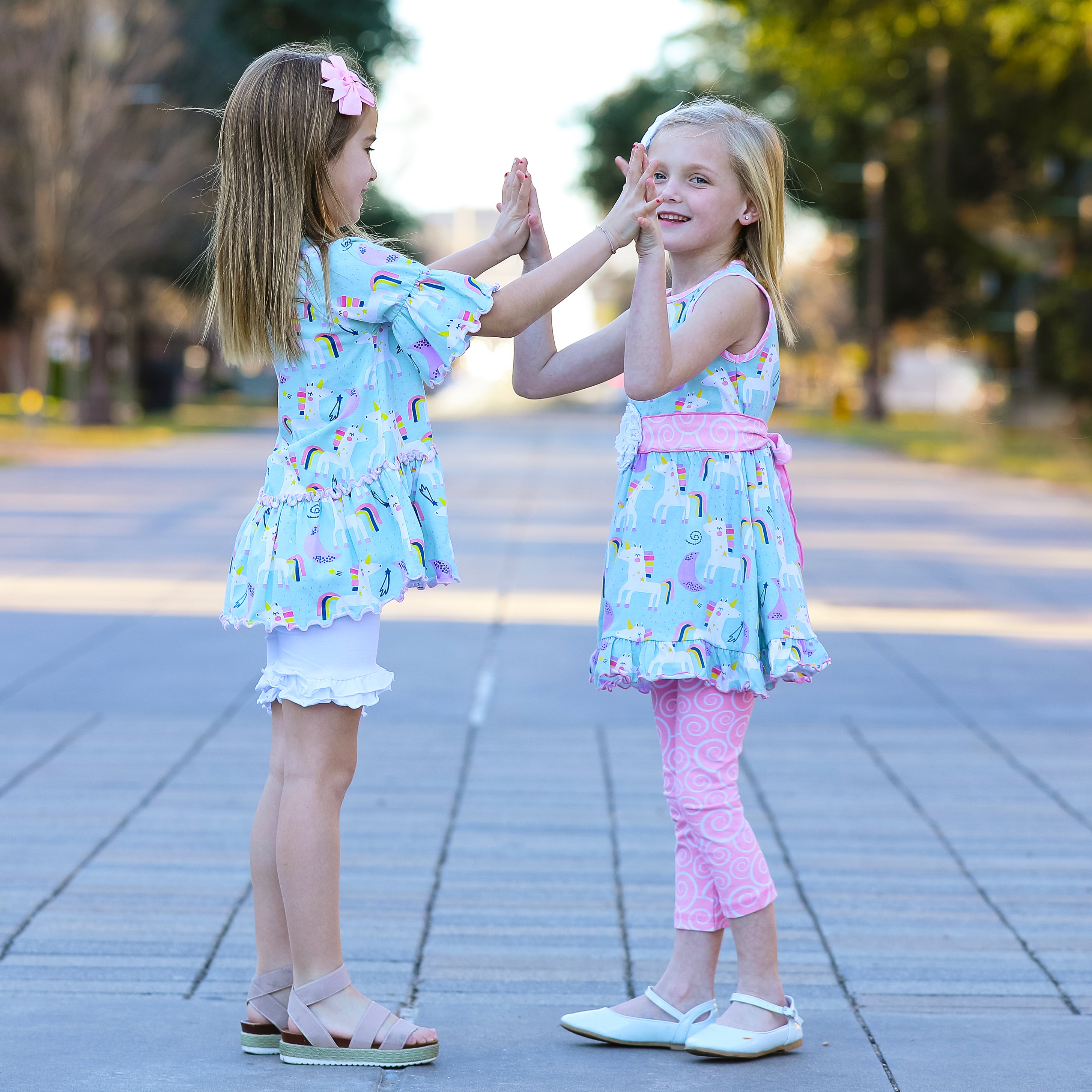 AnnLoren Girls Unicorns Rainbow Dress featuring a unicorn print and pink swirl leggings, perfect for young girls.