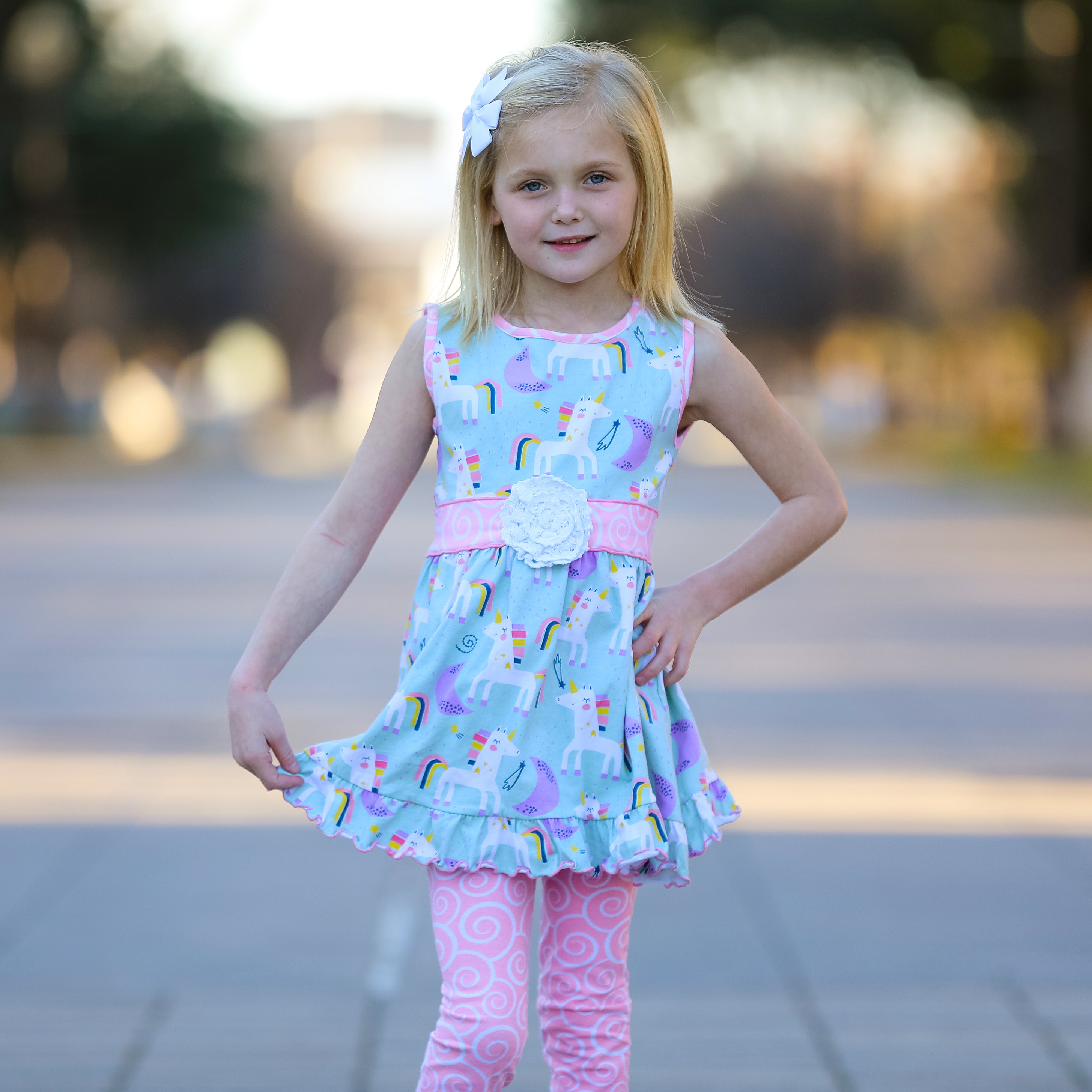 AnnLoren Girls Unicorns Rainbow Dress featuring a unicorn print and pink swirl leggings, perfect for young girls.