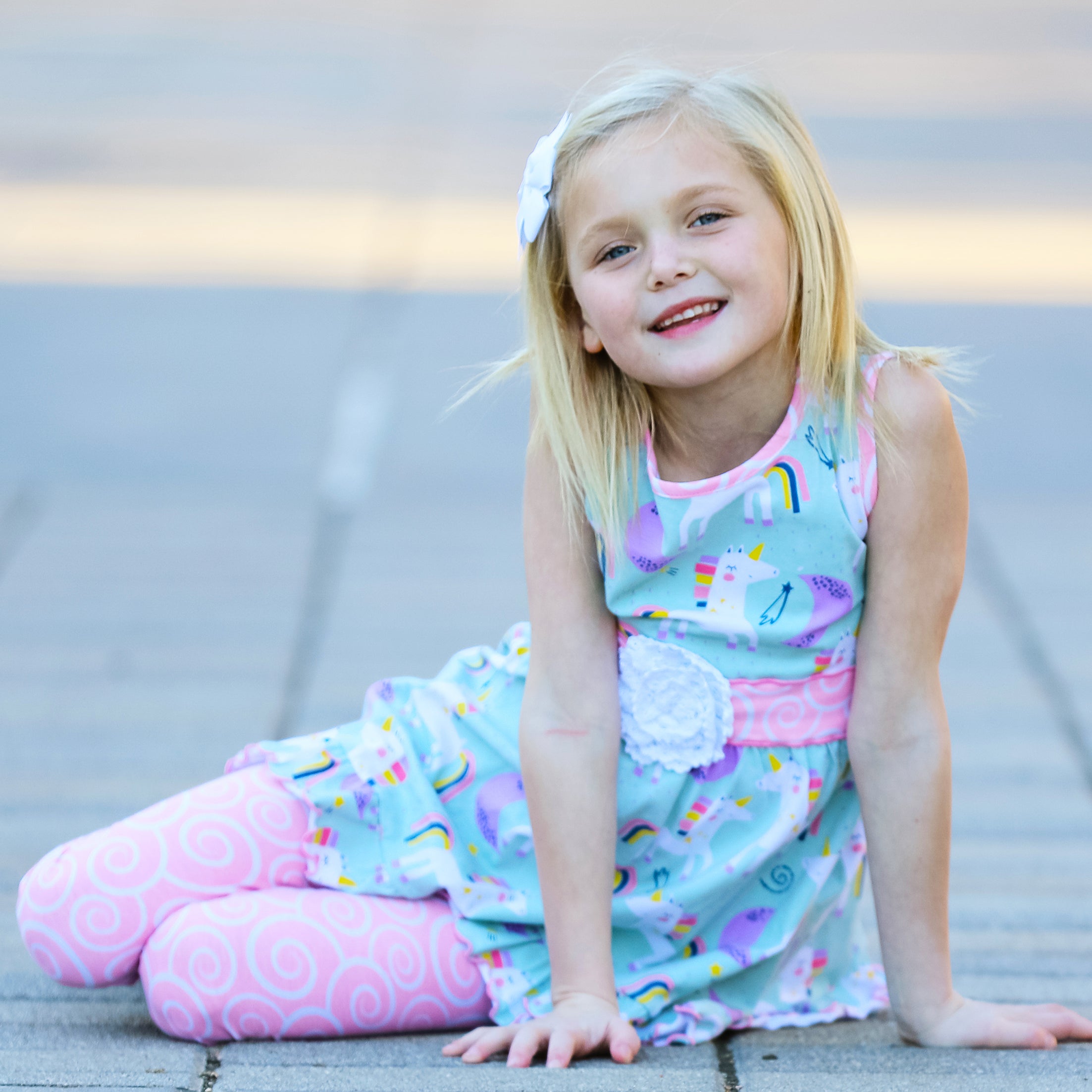 AnnLoren Girls Unicorns Rainbow Dress featuring a unicorn print and pink swirl leggings, perfect for young girls.