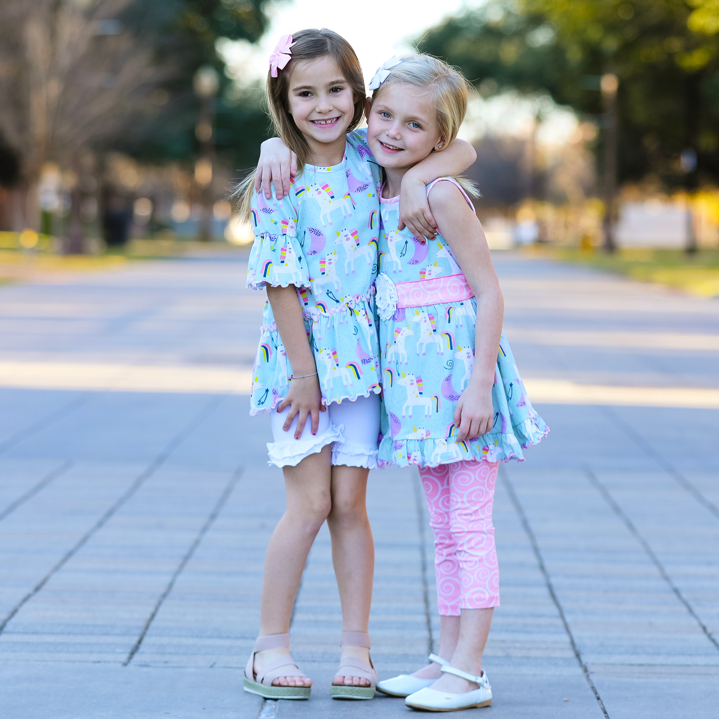 AnnLoren Girls Unicorns Rainbow Dress featuring a unicorn print and pink swirl leggings, perfect for young girls.
