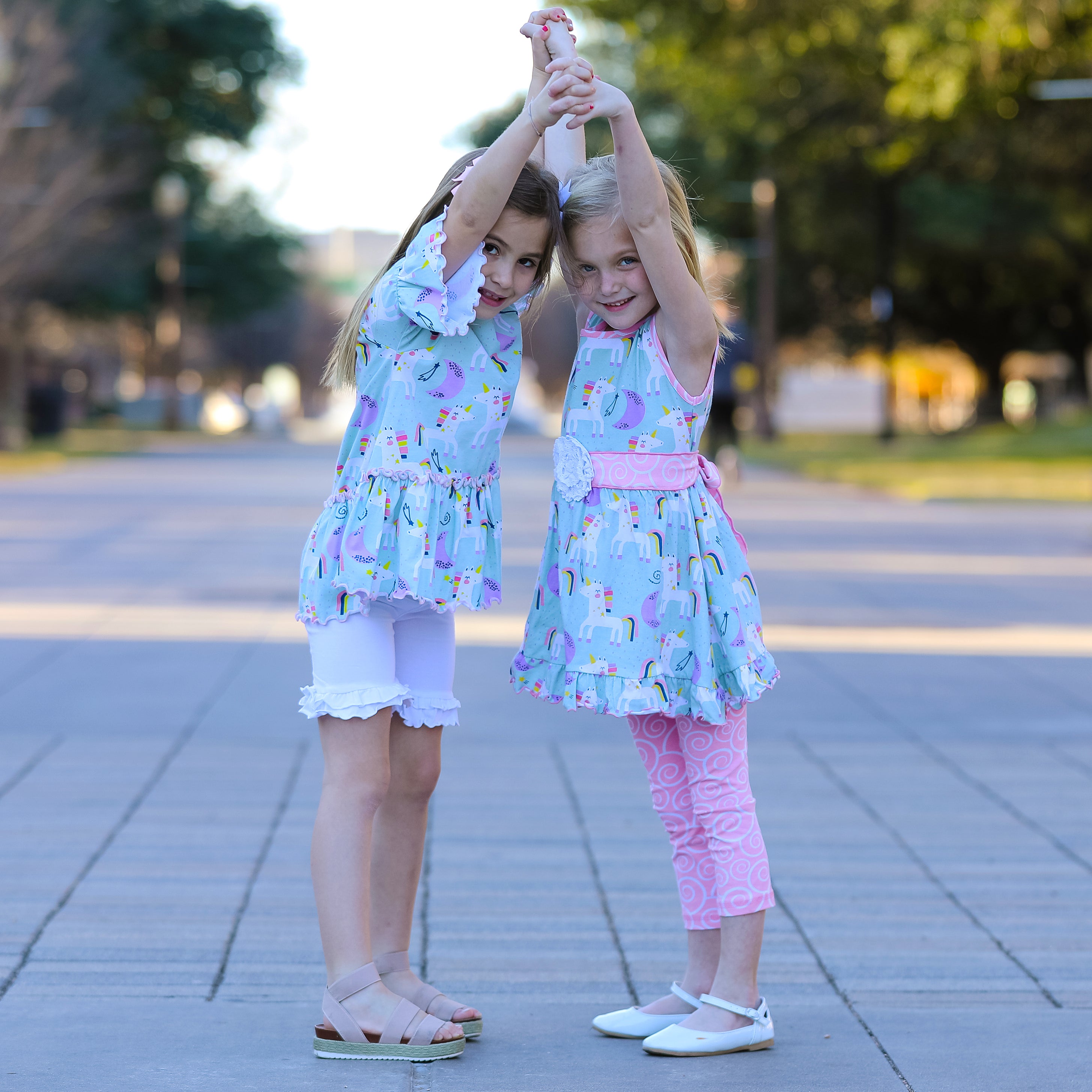 AnnLoren Girls Unicorns Rainbow Dress featuring a unicorn print and pink swirl leggings, perfect for young girls.