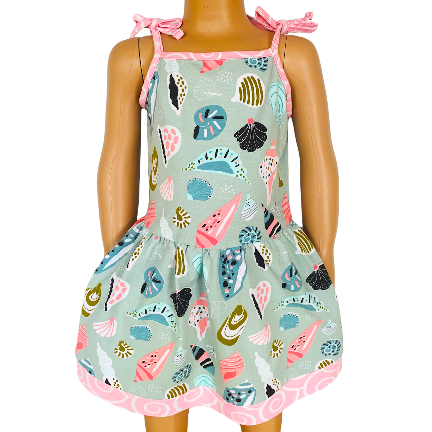 AnnLoren Little & Big Girls Seashells Dress featuring spaghetti straps and pink swirl trim, made from soft cotton knit fabric.