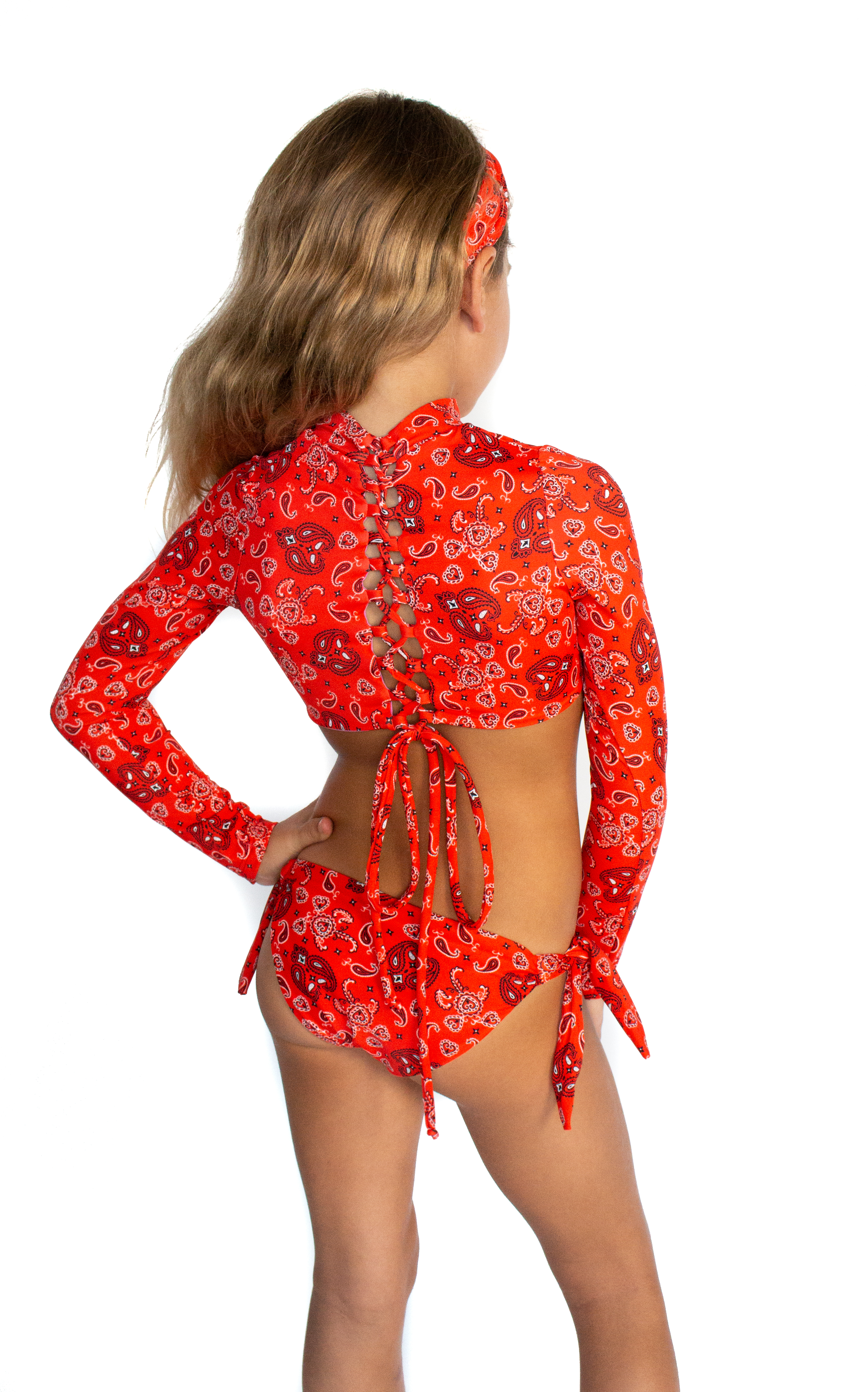 A stylish bandana print bikini crop top swimsuit made from printed Lycra, featuring UPF 50+ sun protection.