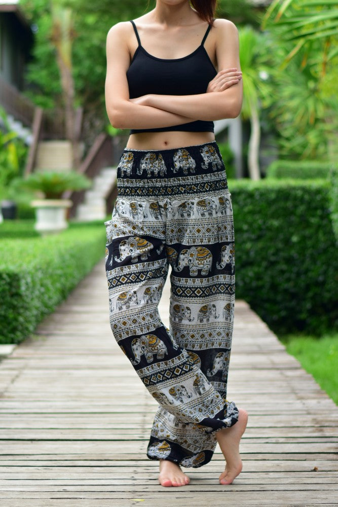 Bohotusk Kids Black Elephant Savannah Print Harem Trousers with elasticated waist and ankle, showcasing vibrant elephant print design.