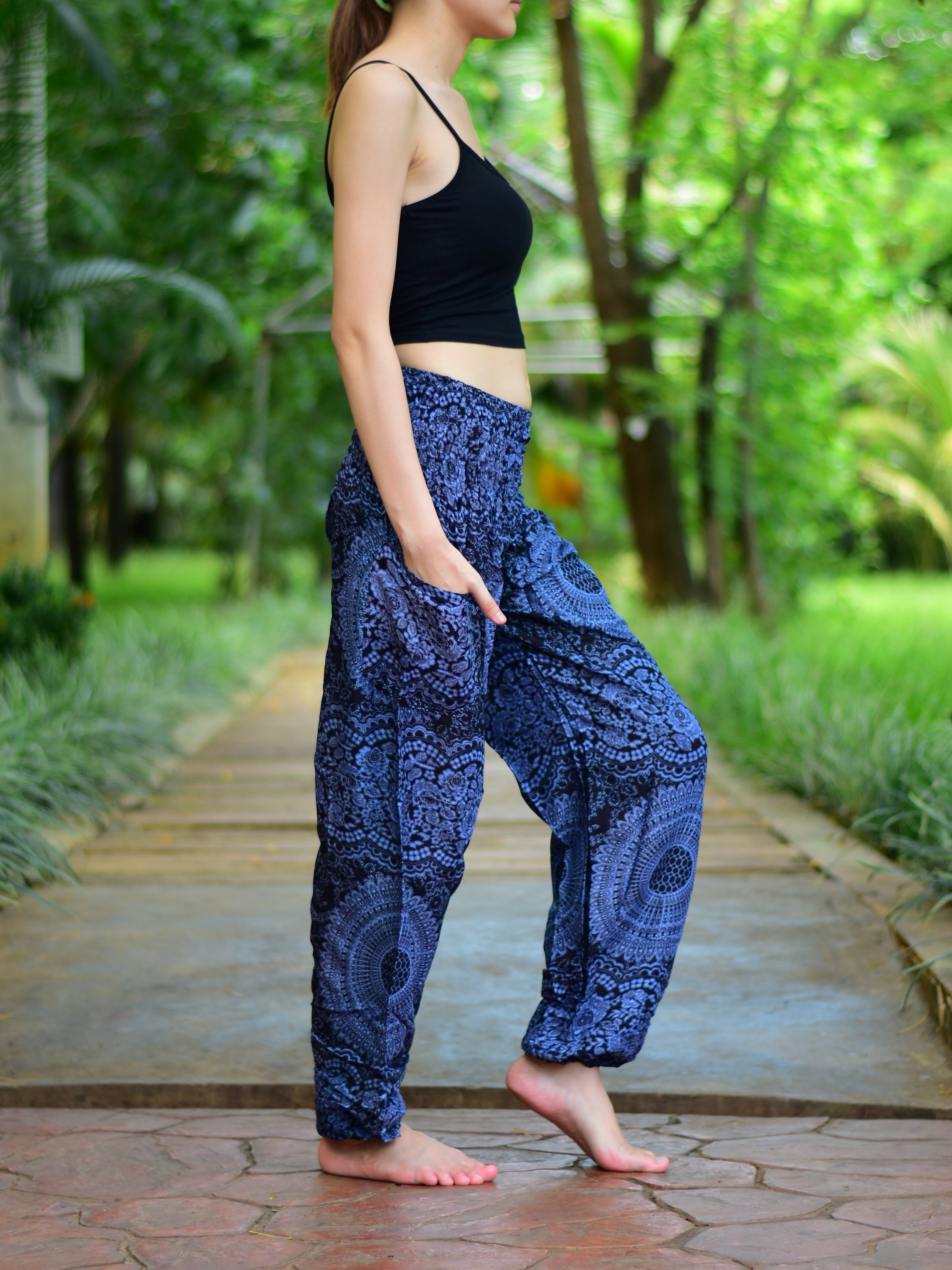 Bohotusk Kids Black Night Glow Harem Pants featuring elasticated smocked waist and soft rayon fabric, perfect for active children.