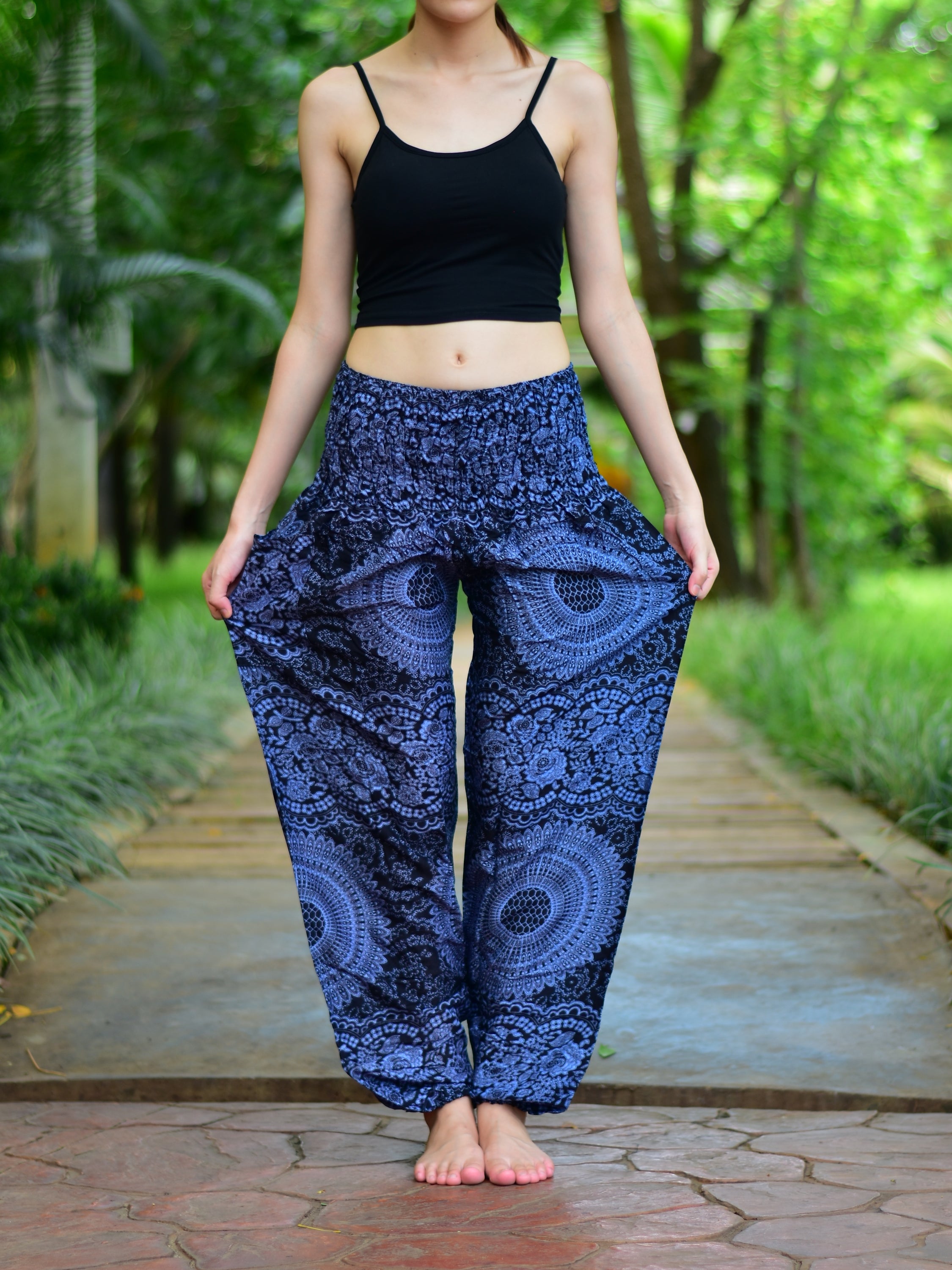 Bohotusk Kids Black Night Glow Harem Pants featuring elasticated smocked waist and soft rayon fabric, perfect for active children.