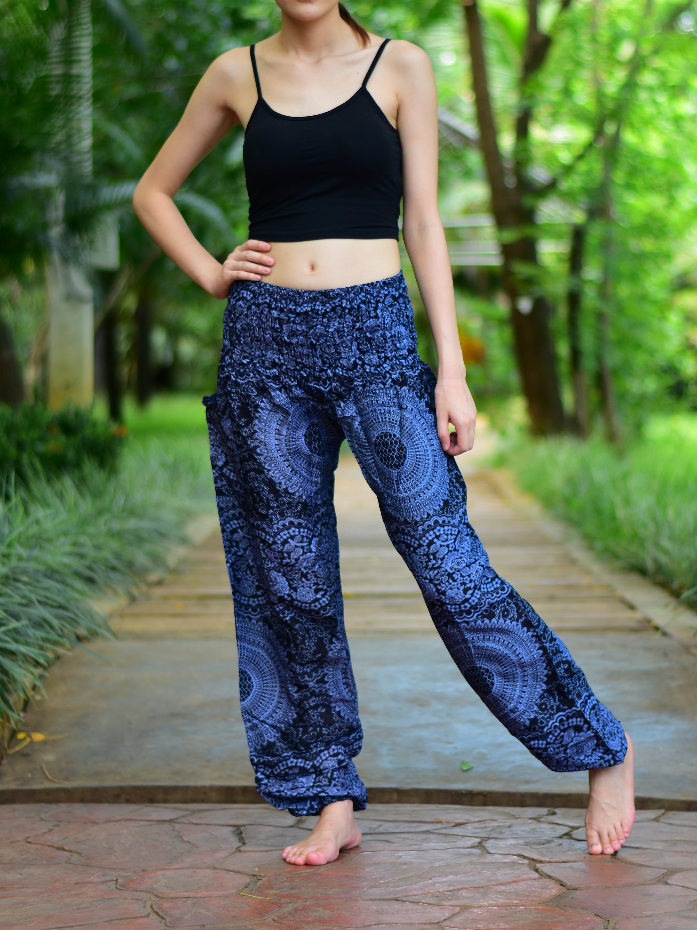 Bohotusk Kids Black Night Glow Harem Pants featuring elasticated smocked waist and soft rayon fabric, perfect for active children.