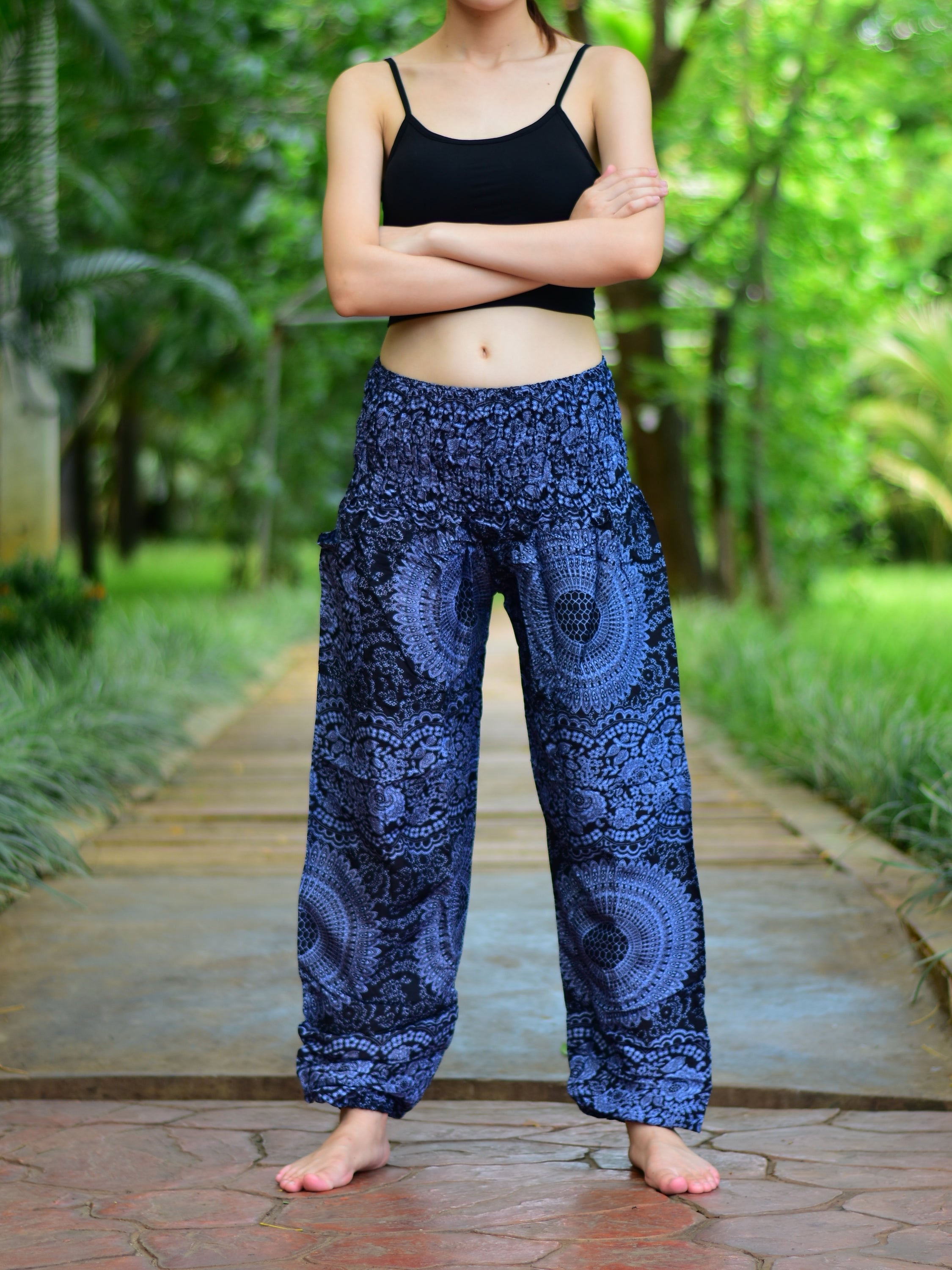 Bohotusk Kids Black Night Glow Print Harem trousers featuring elasticated waist and ankles, made from soft rayon fabric.