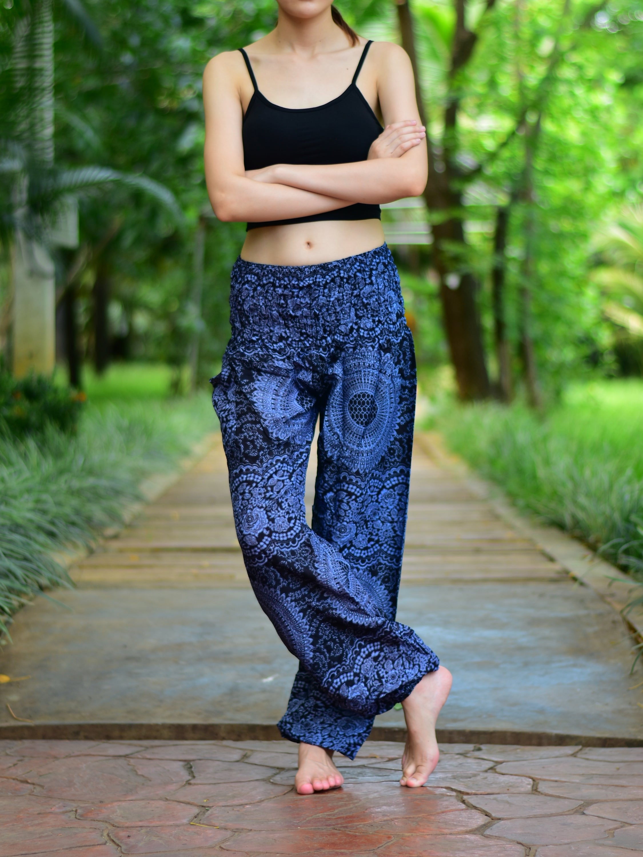 Bohotusk Kids Black Night Glow Print Harem trousers featuring elasticated waist and ankles, made from soft rayon fabric.