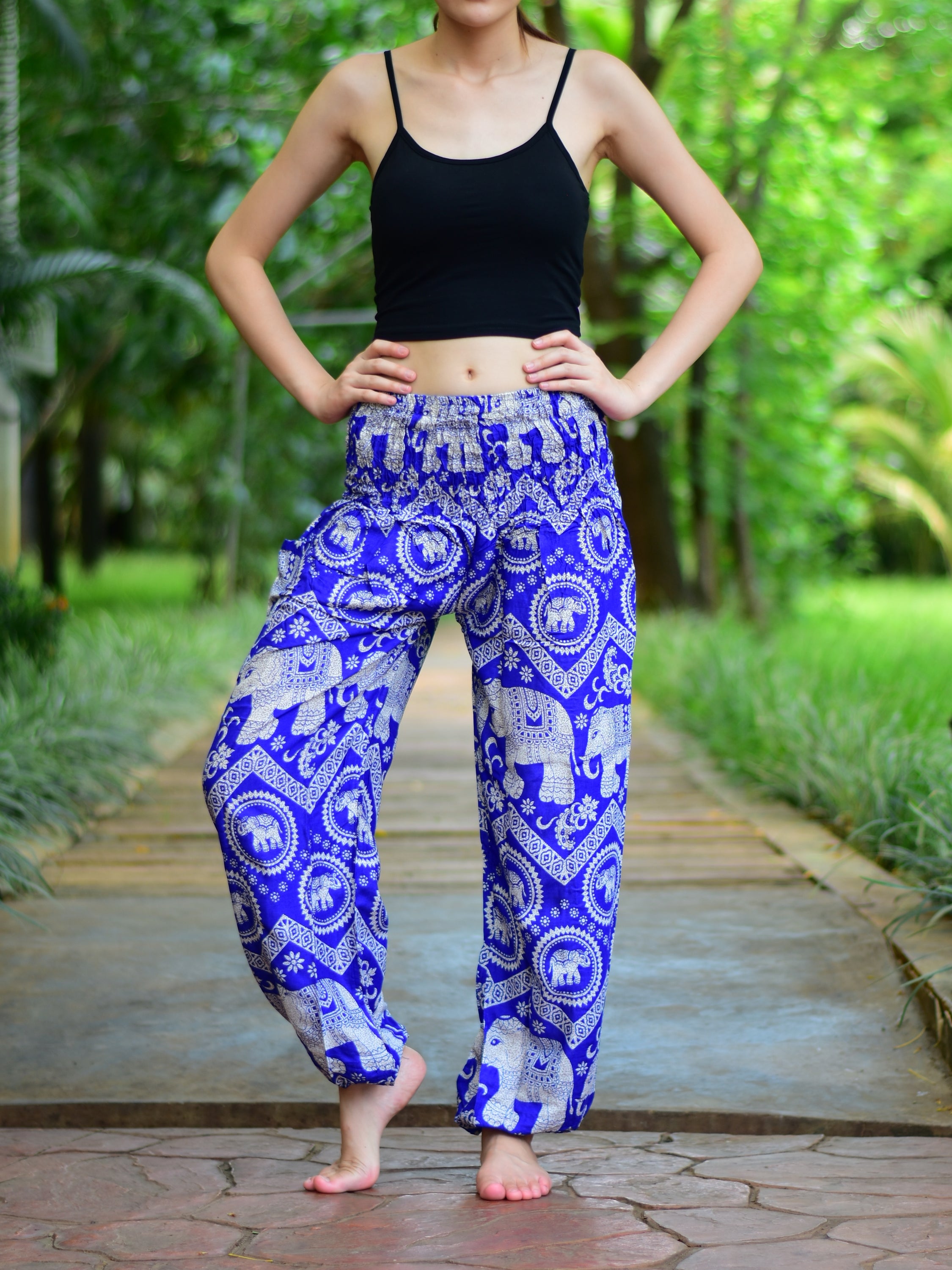 Bohotusk Kids Mid Blue Elephant Paradise trousers featuring a vibrant elephant print, elasticated waist, and soft rayon fabric, perfect for kids.