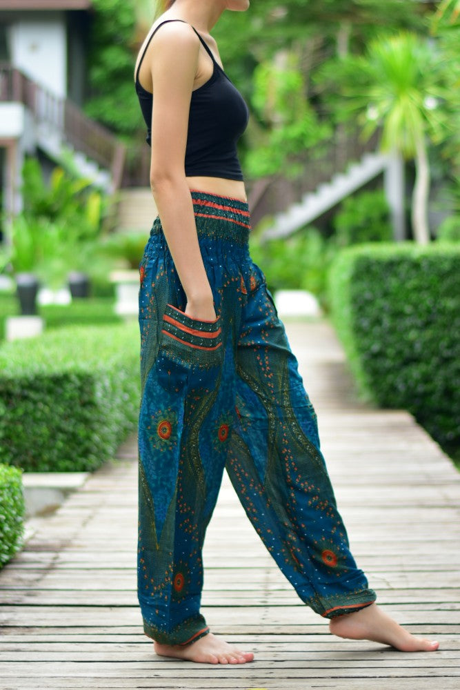 Bohotusk Kids Teal Moonshine Print Harem Pants featuring elasticated waist and ankles, made from soft rayon fabric.