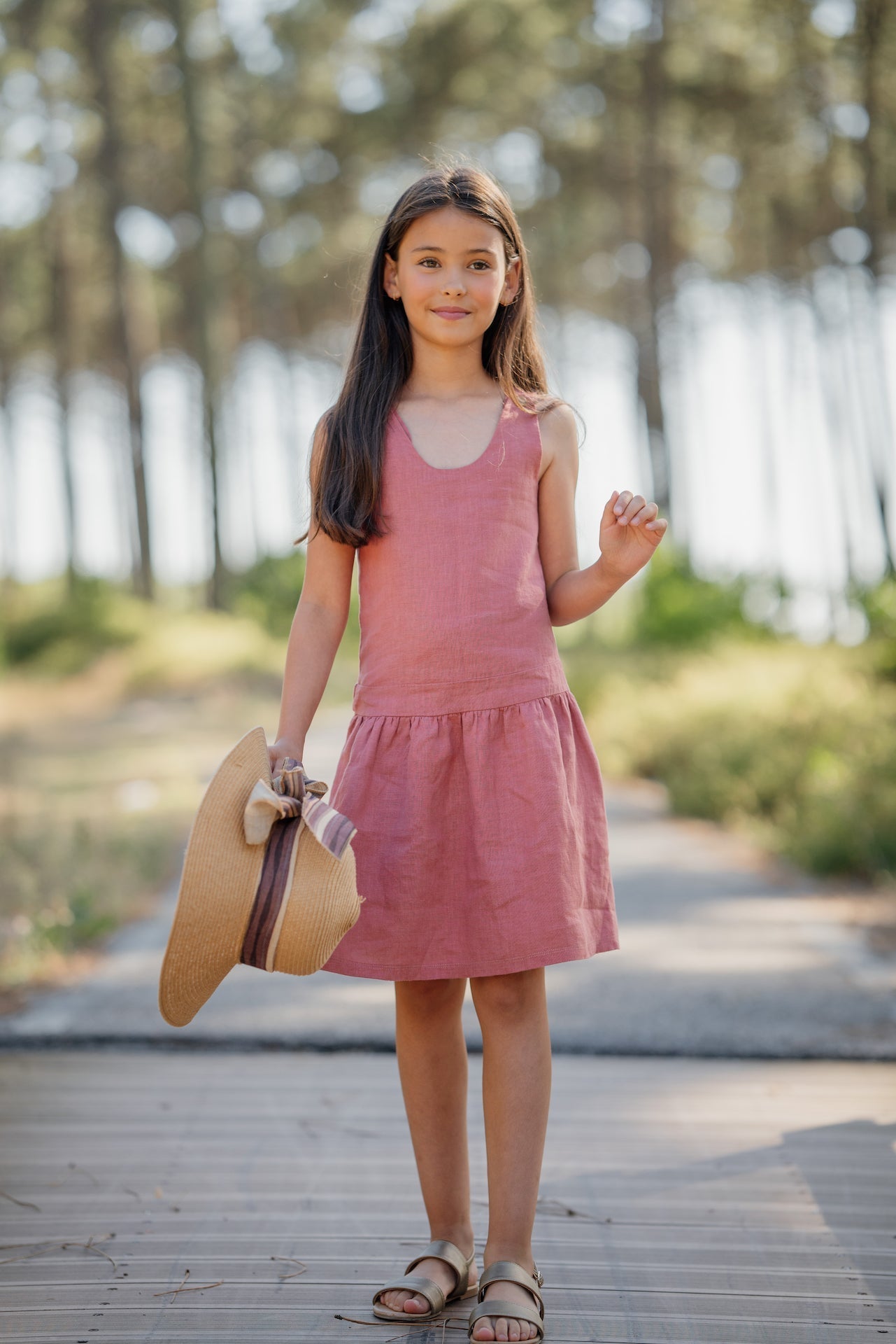 Dungaree Sienna Cream dress made from soft natural linen with adjustable straps and side zip.