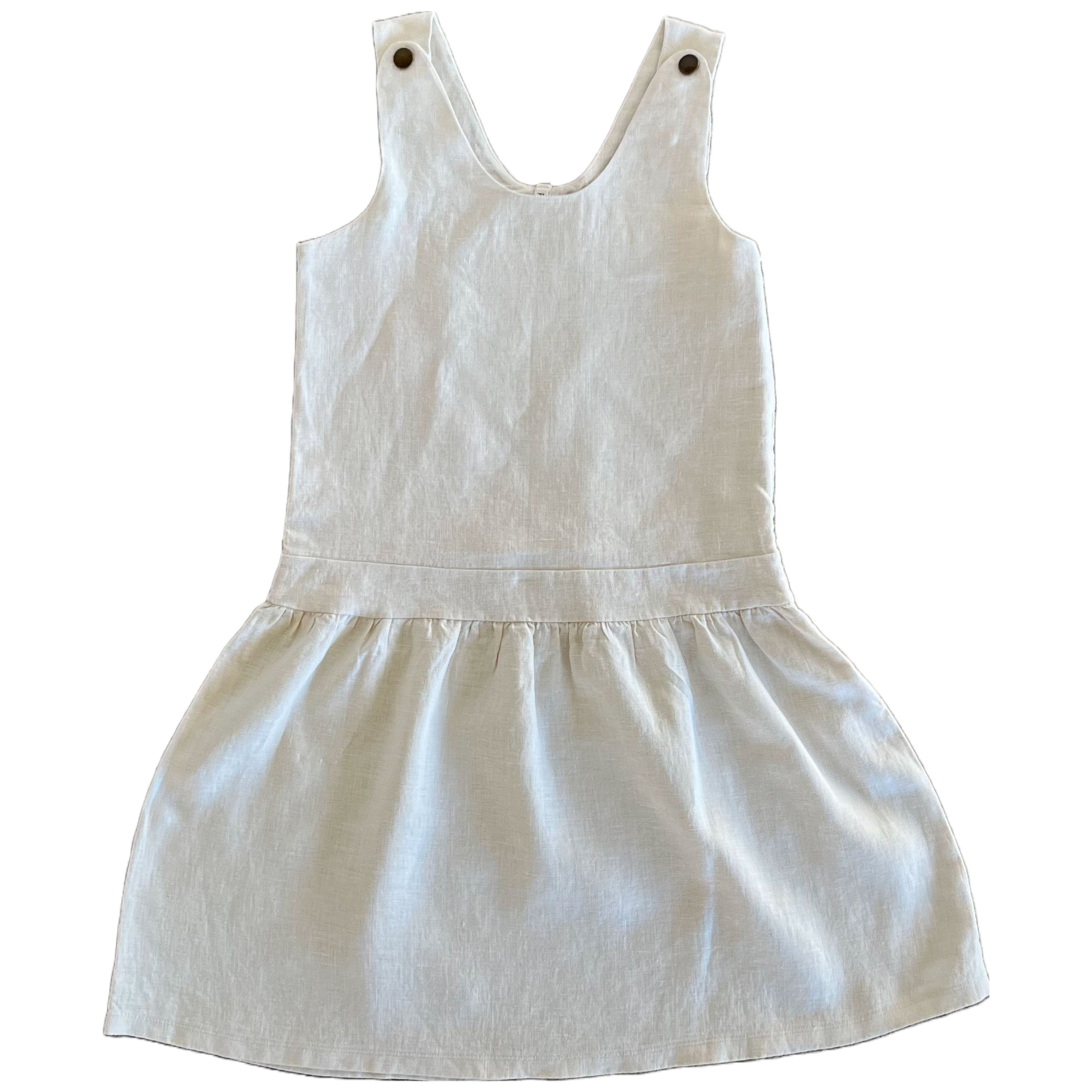 Dungaree Sienna Cream dress made from soft natural linen with adjustable straps and side zip.