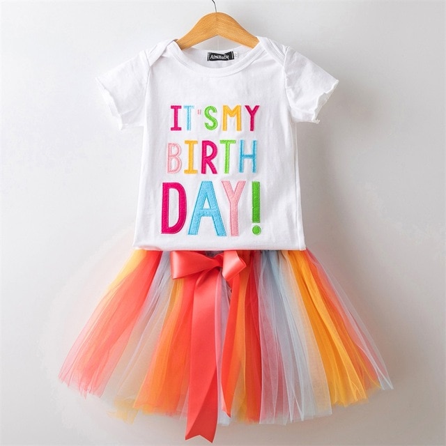 Birthday outfit with colorful tutu.