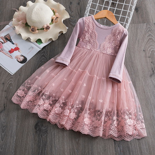 Pink lace dress with hat.