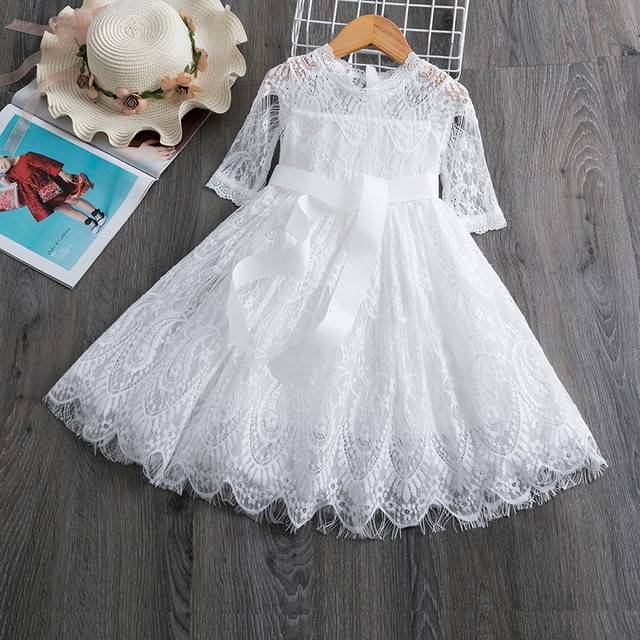 White lace dress with ribbon.