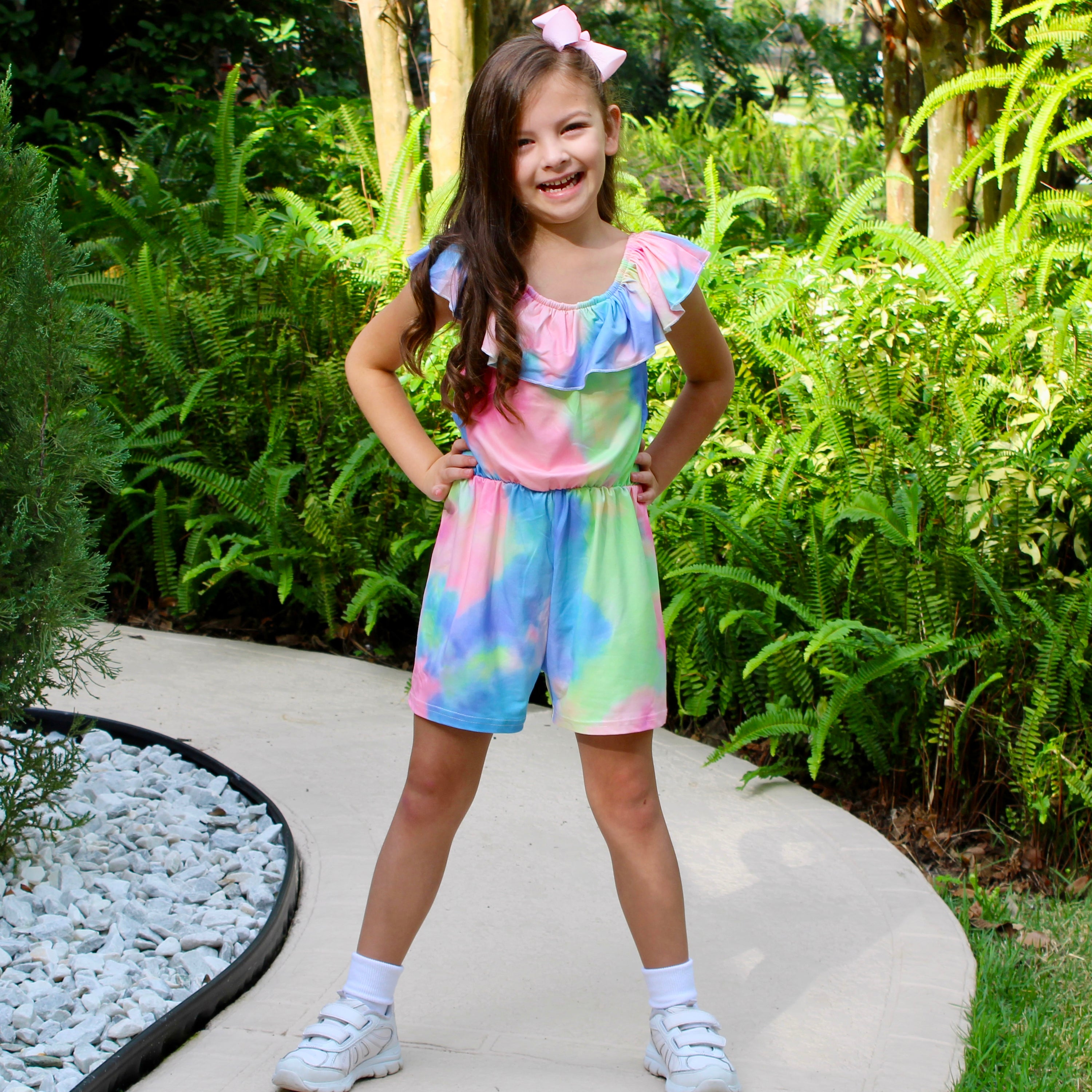 Girls pastel tie dye shorts jumpsuit with ruffle neckline and tie sash, perfect for spring and Easter.