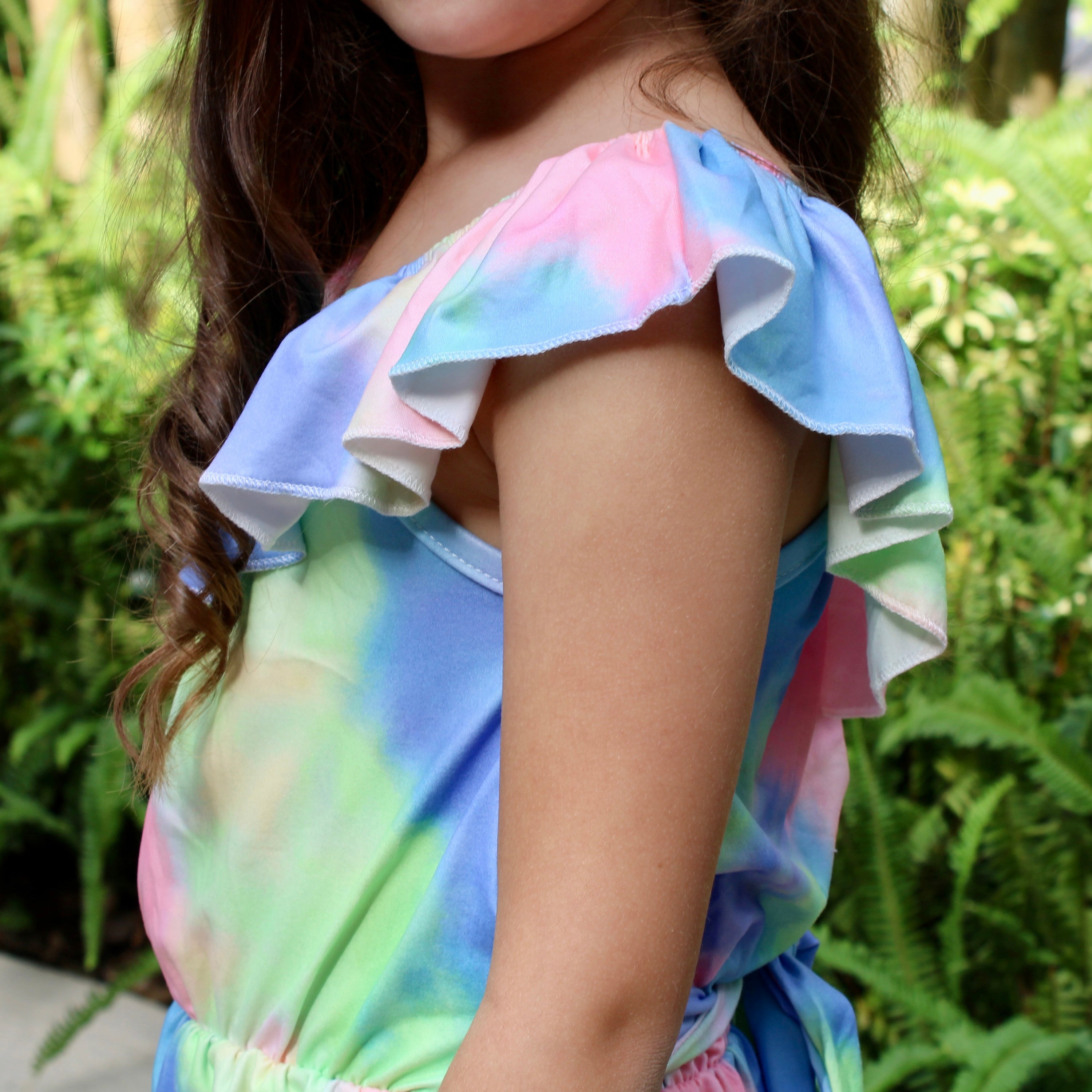 Girls pastel tie dye shorts jumpsuit with ruffle neckline and tie sash, perfect for spring and Easter.