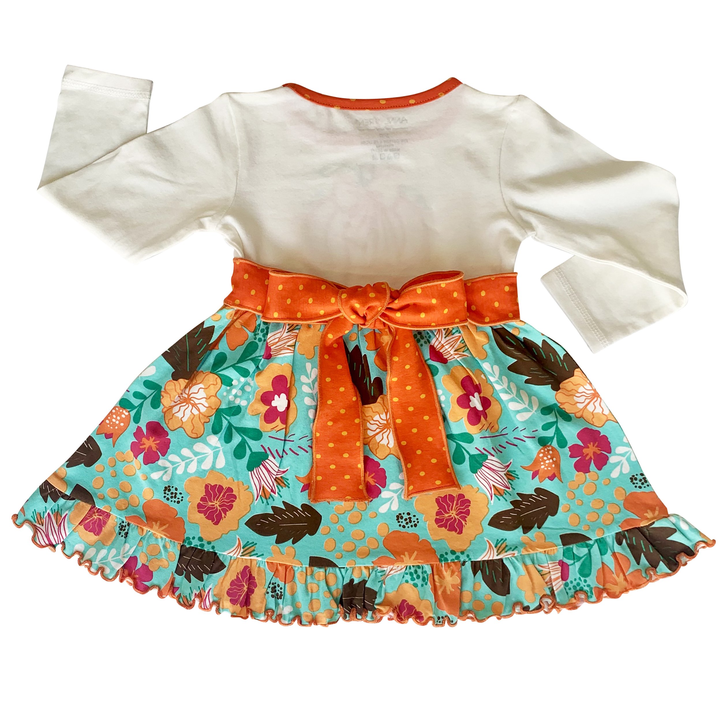 Girls vibrant autumn floral pumpkin dress with leggings, featuring a cream tunic with an embroidered pumpkin patch and orange polka dot ruffle.