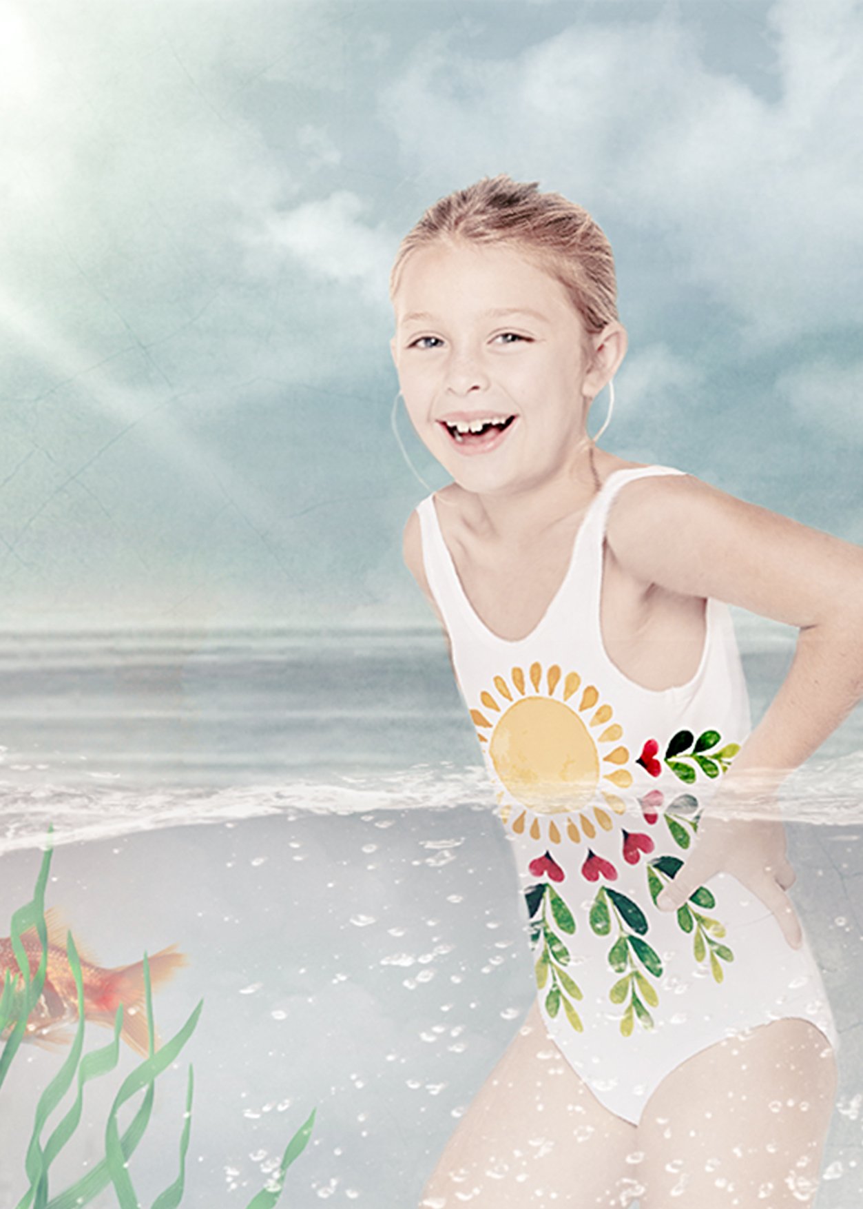 Happy Sun Tank Swimsuit featuring a vibrant sun print and a matching cover-up poncho, perfect for summer beach days.