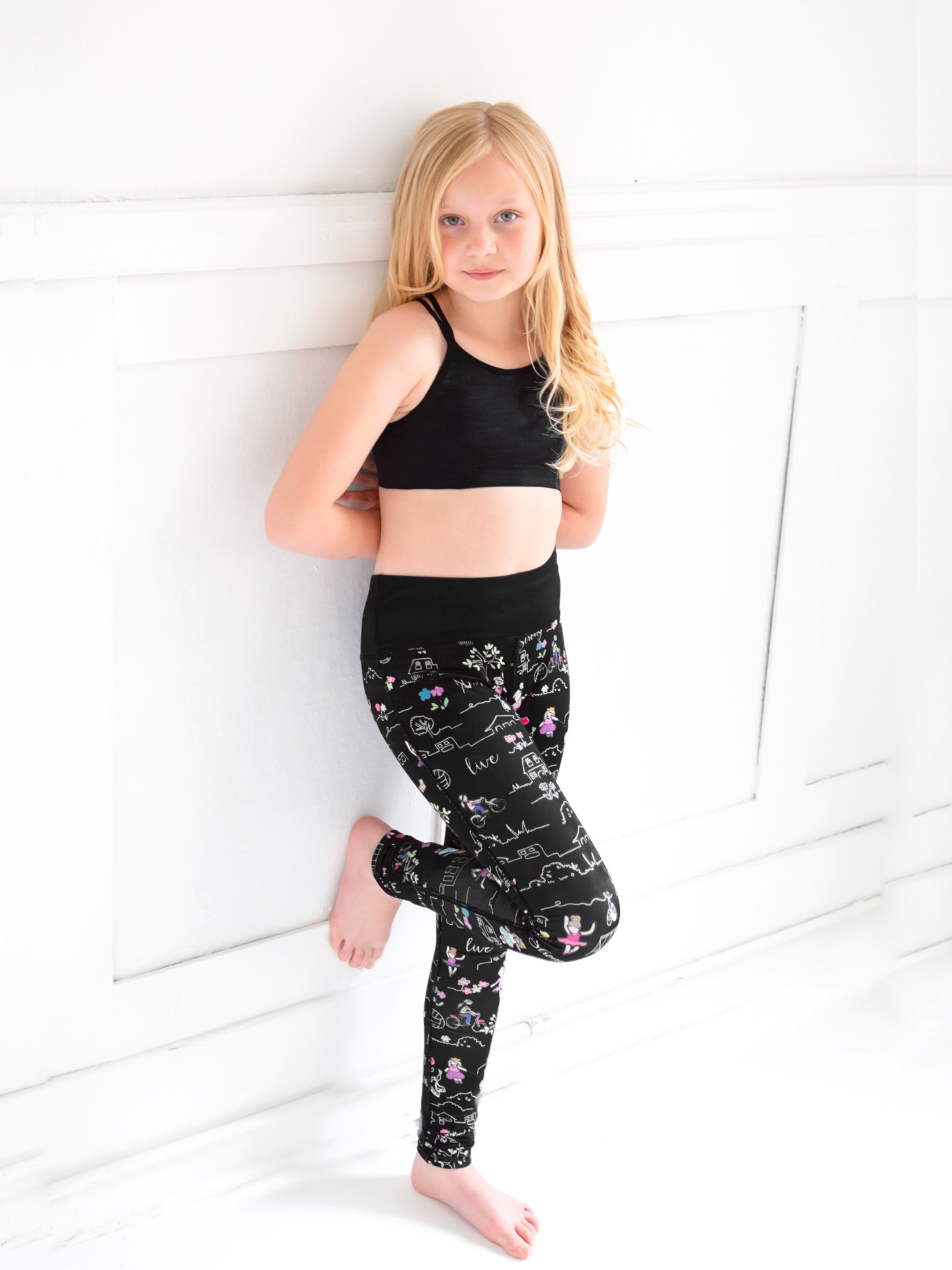Katja Printed Leggings by Limeapple featuring a wide waistband and vibrant prints, perfect for active girls.