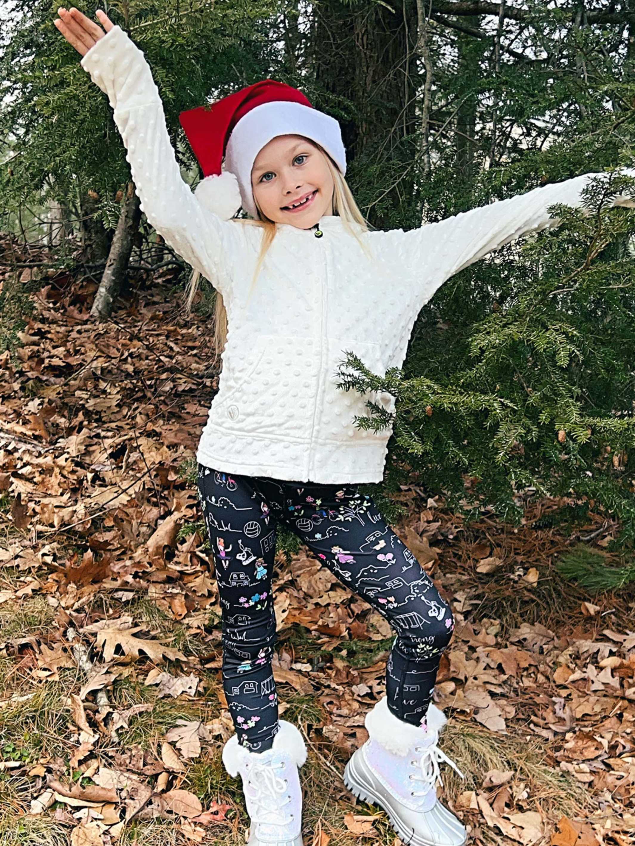 Katja Printed Leggings by Limeapple featuring a wide waistband and vibrant prints, perfect for active girls.