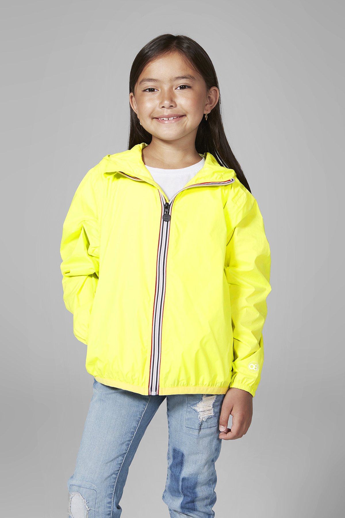 Kids yellow fluo full zip packable rain jacket, showcasing its vibrant color and packable design.