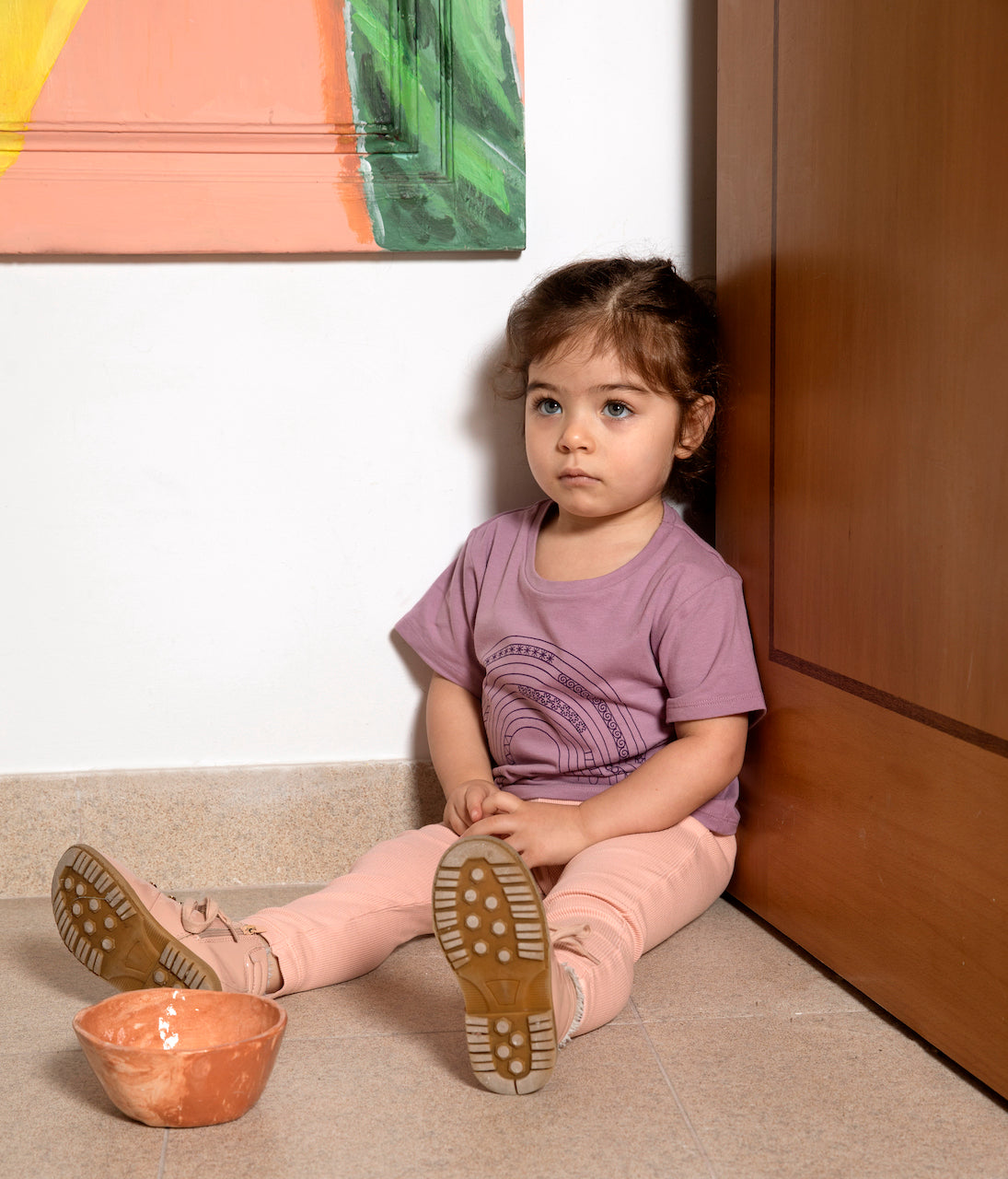 A pair of purple leggings for babies and toddlers, featuring an elasticised waist and made from soft organic cotton.