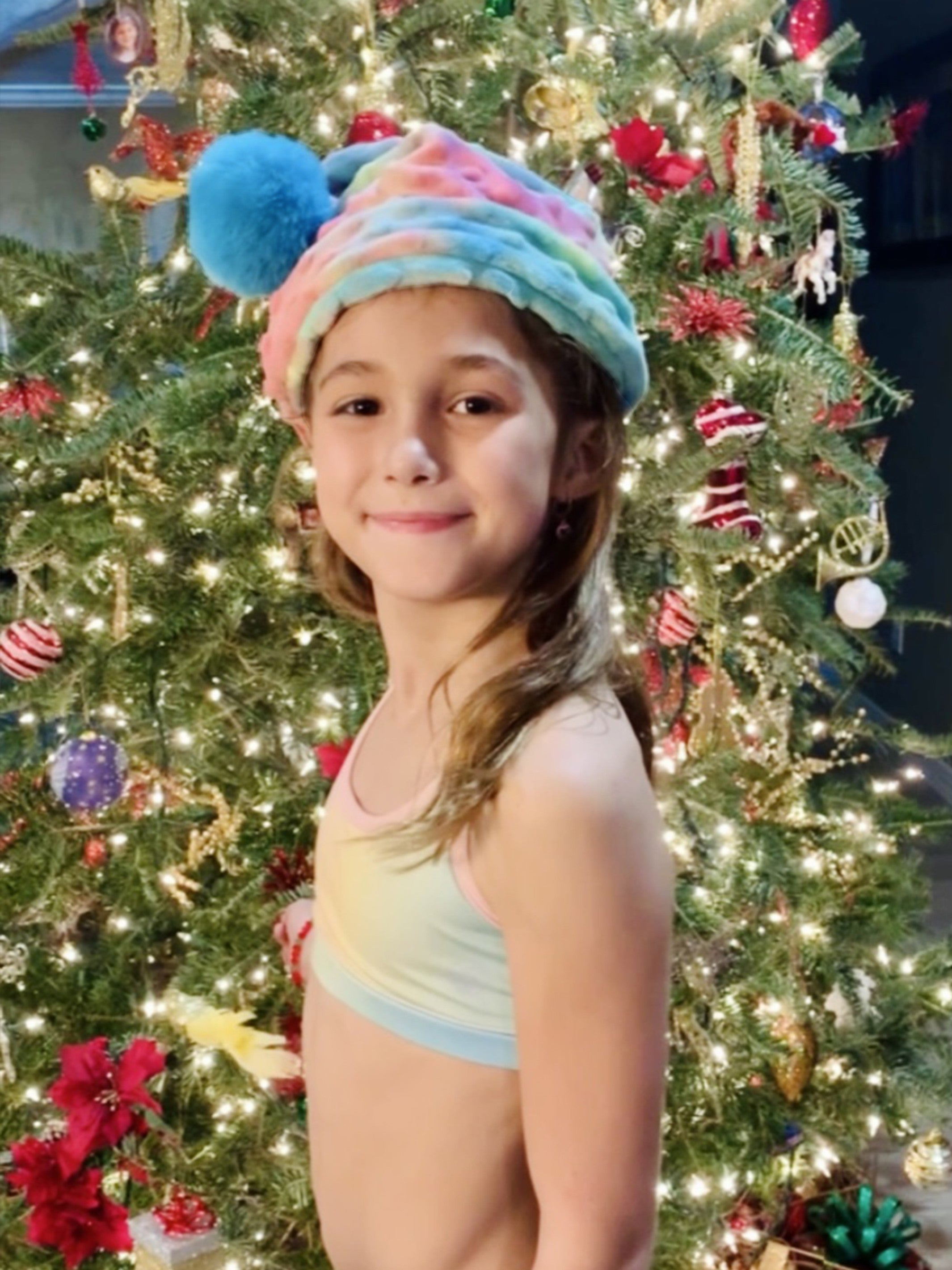 Minky Dot Bubble Beanie in Cotton Candy Tie Dye with a fluffy pom-pom puff, showcasing vibrant colors and soft texture.