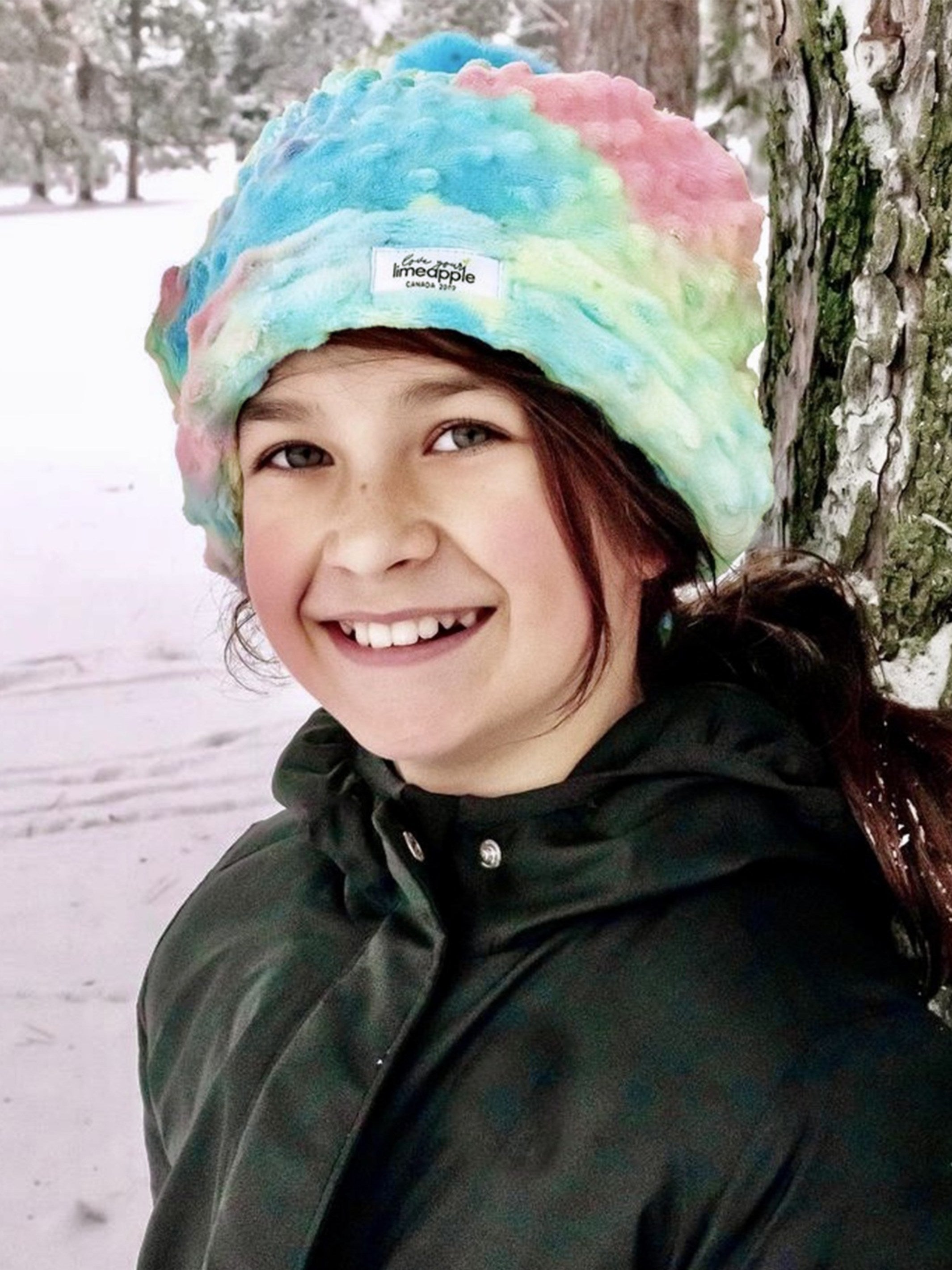 Minky Dot Bubble Beanie in Cotton Candy Tie Dye with a fluffy pom-pom puff, showcasing vibrant colors and soft texture.