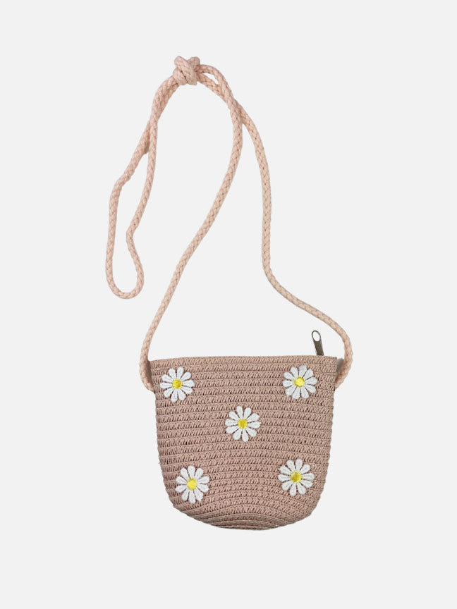 A charming beige straw purse and matching hat adorned with daisy patches and a sheer ribbon bow, perfect for spring outings.