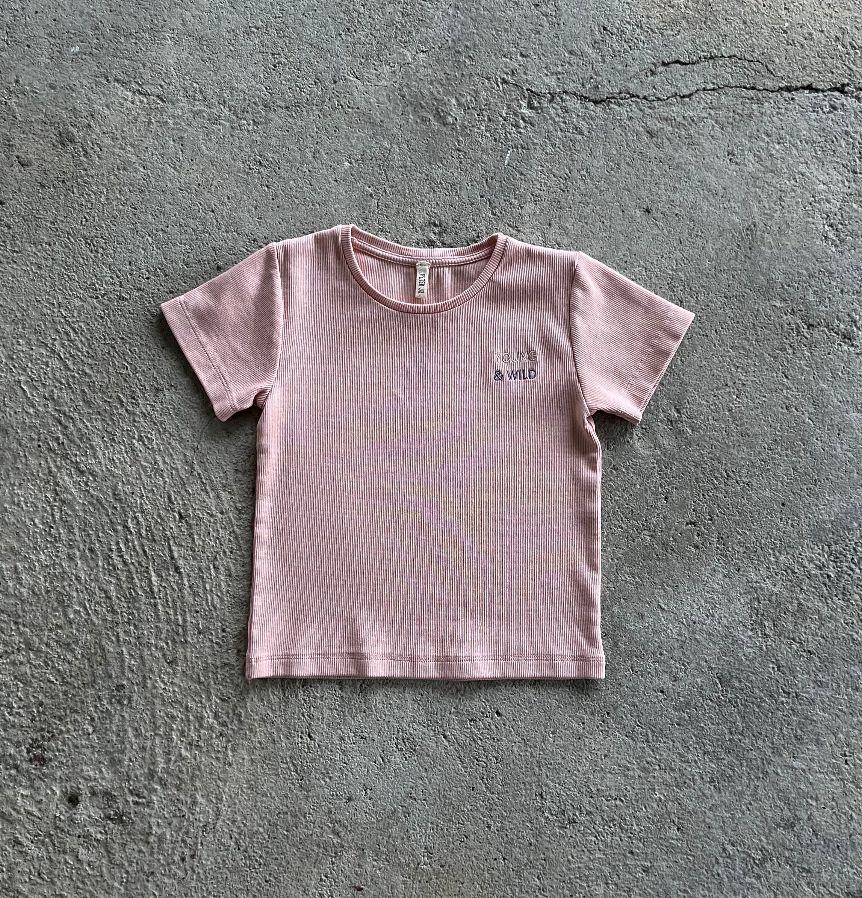 T-Shirt Louise Pink made from organic cotton, featuring a soft ribbed texture and elasticised waist, perfect for babies and toddlers.