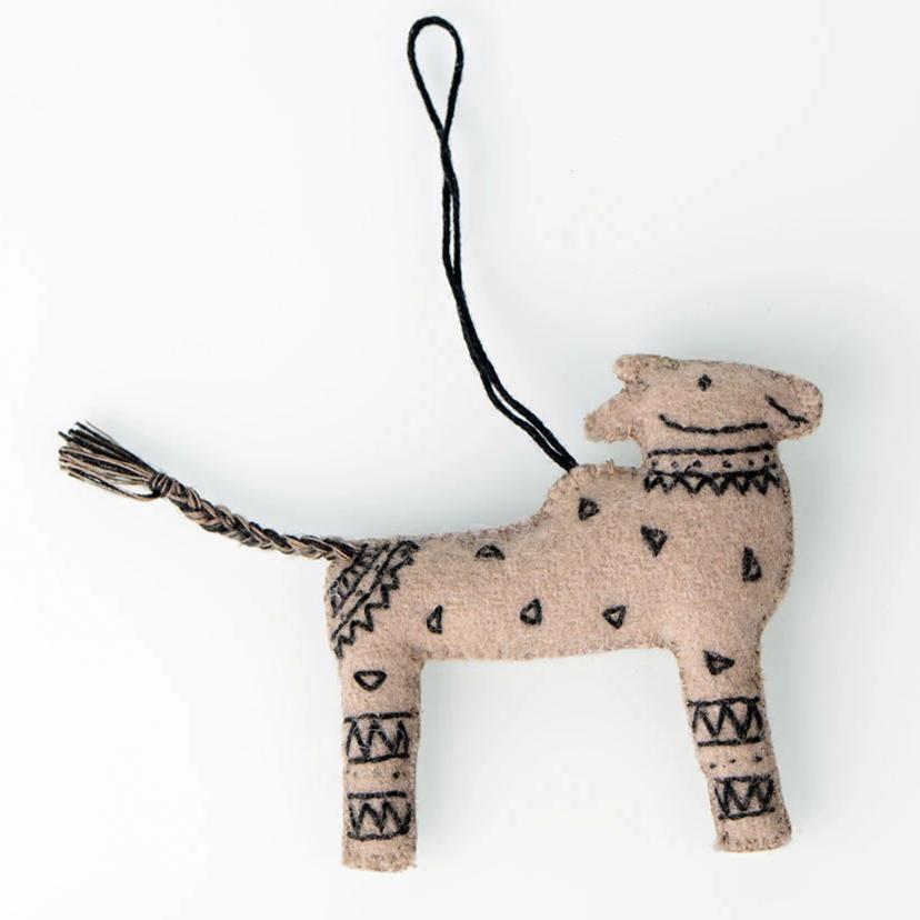 Handcrafted felt ornaments featuring a cow and elephant design, beautifully stitched and embroidered.